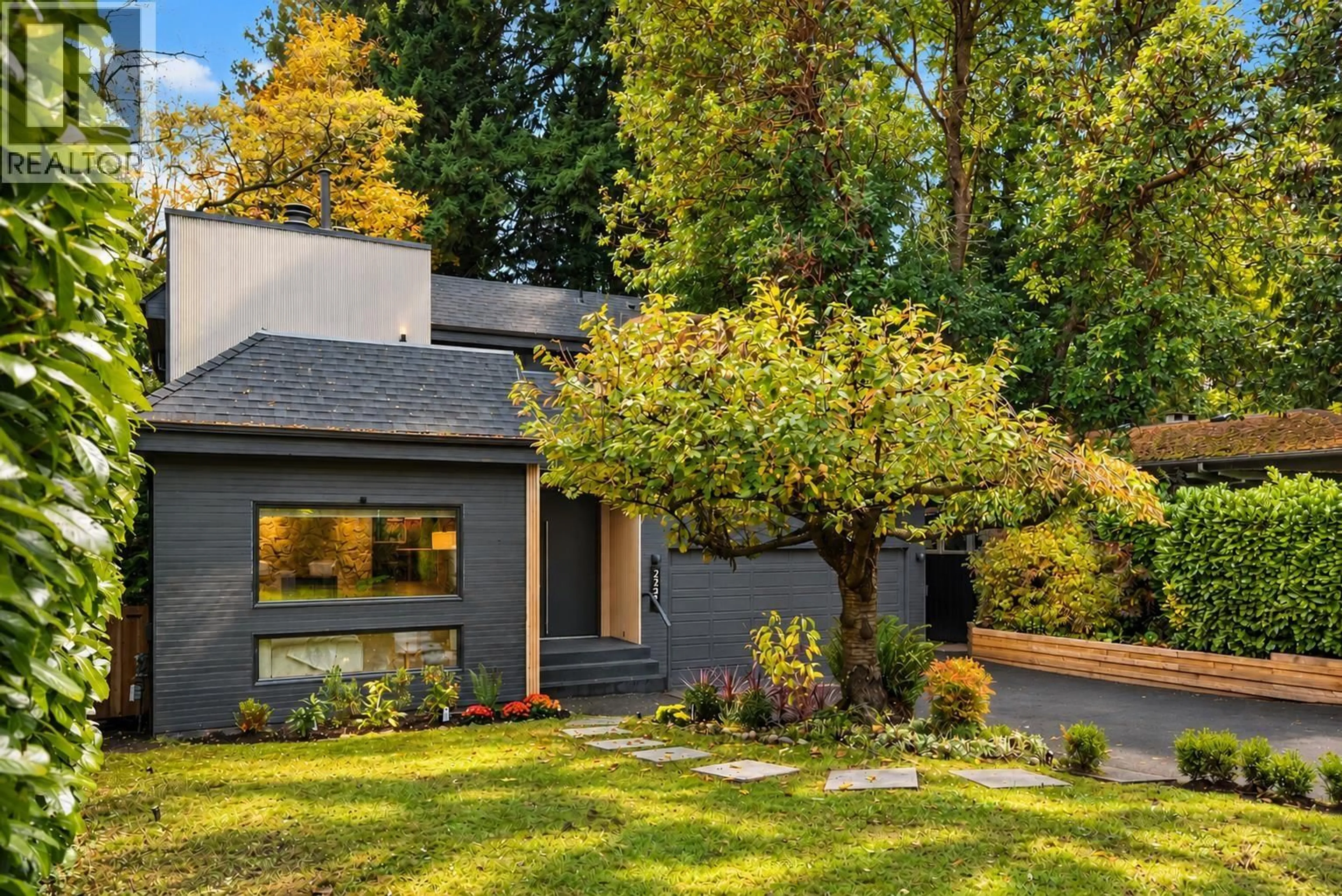Home with brick exterior material, street for 2221 BOWSER AVENUE, North Vancouver British Columbia V7P2Z1