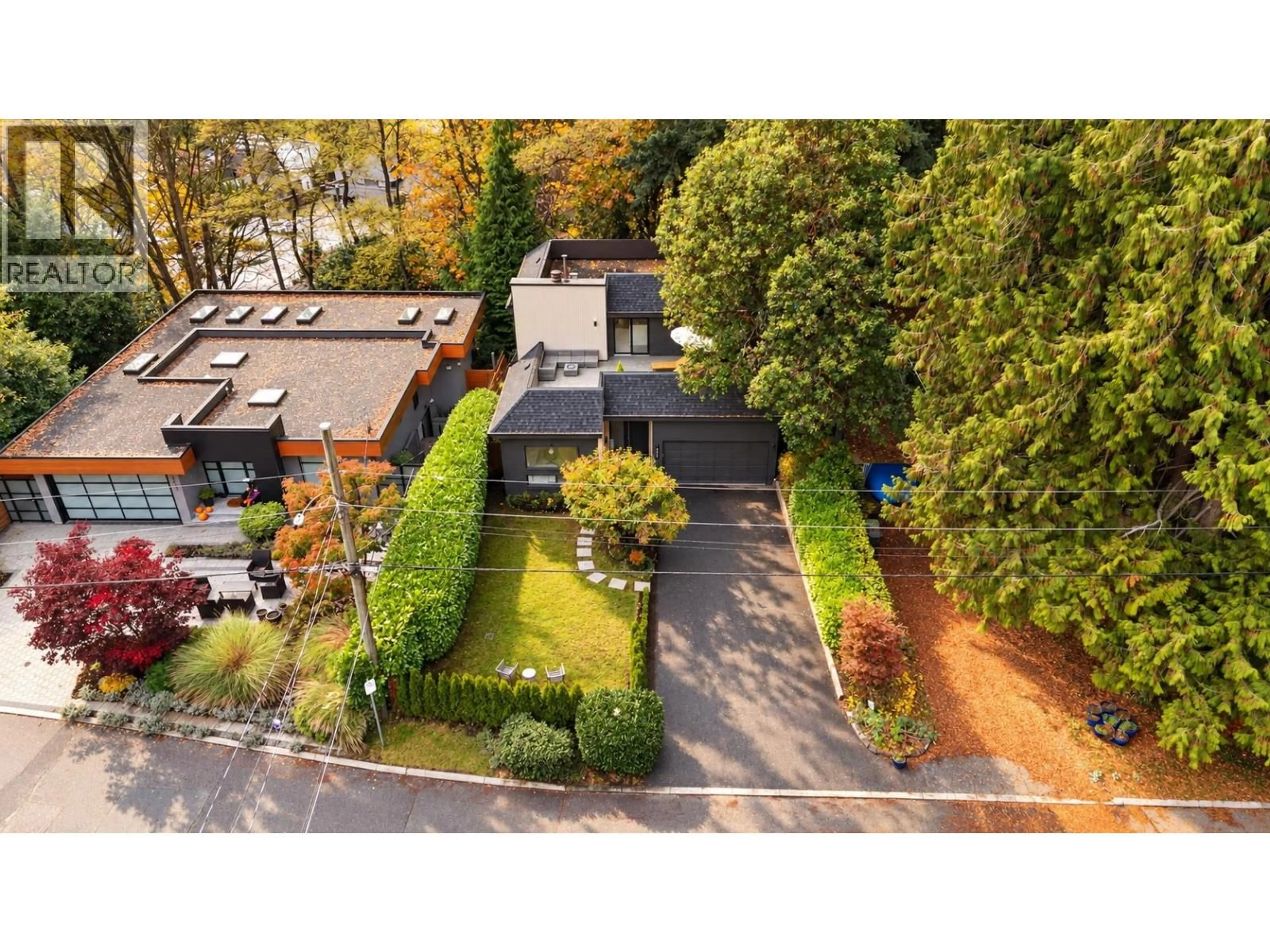 A pic from outside/outdoor area/front of a property/back of a property/a pic from drone, street for 2221 BOWSER AVENUE, North Vancouver British Columbia V7P2Z1