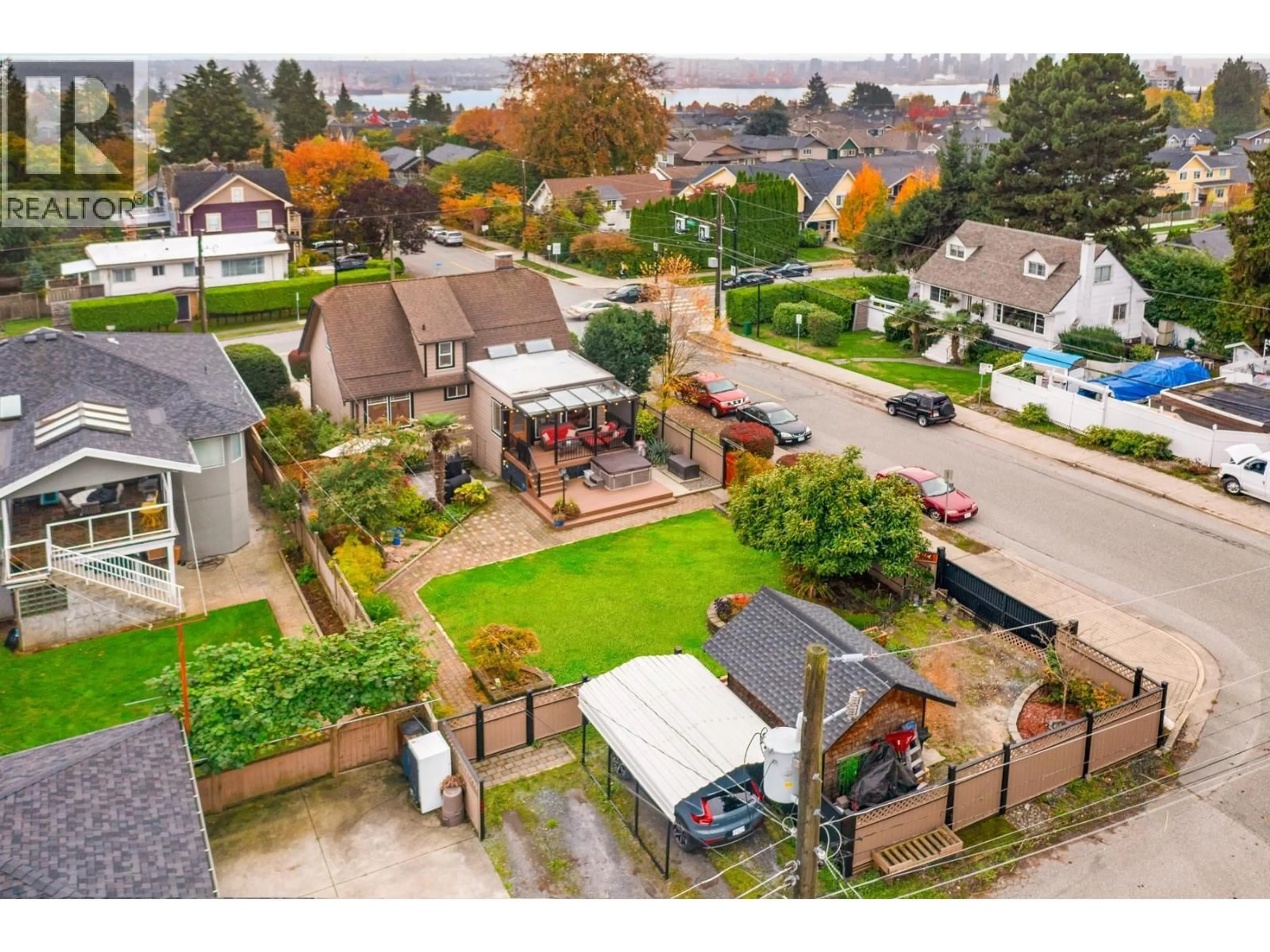 A pic from outside/outdoor area/front of a property/back of a property/a pic from drone, street for 402 13TH STREET, North Vancouver British Columbia V7L2M1