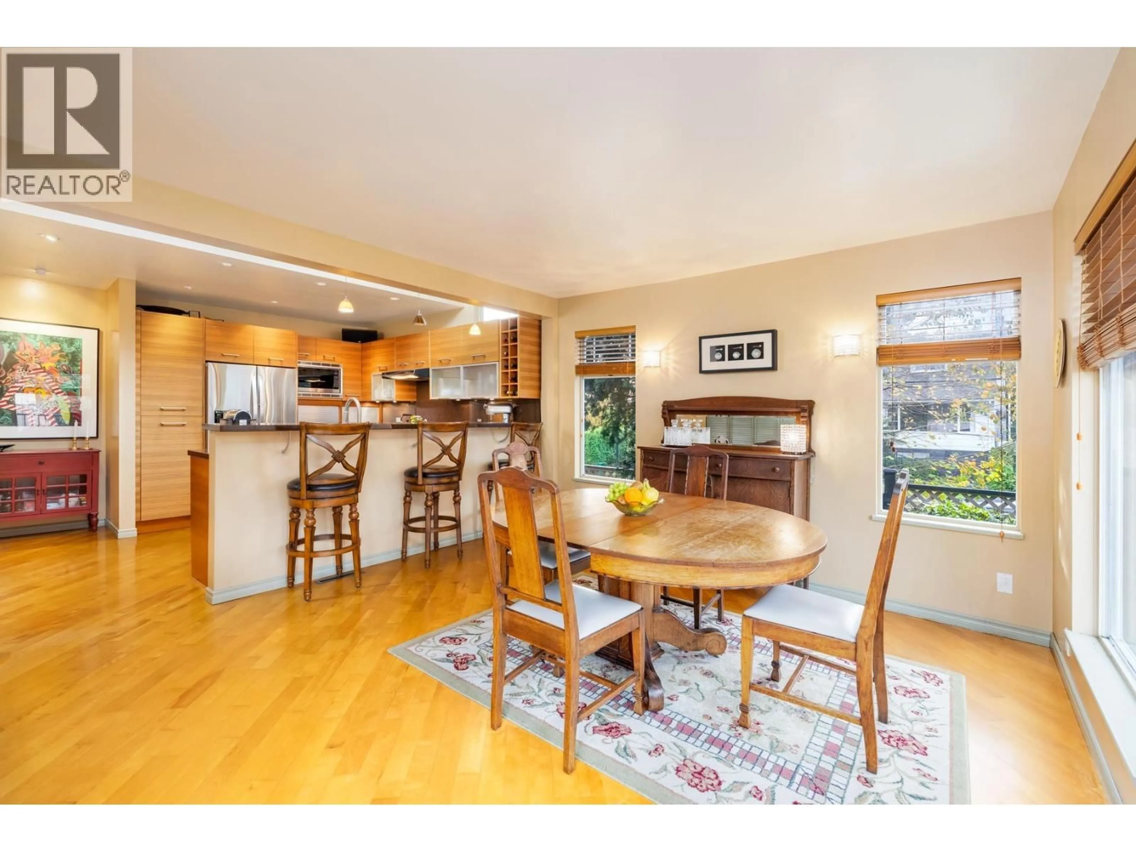 Open concept kitchen, wood/laminate floor for 402 13TH STREET, North Vancouver British Columbia V7L2M1