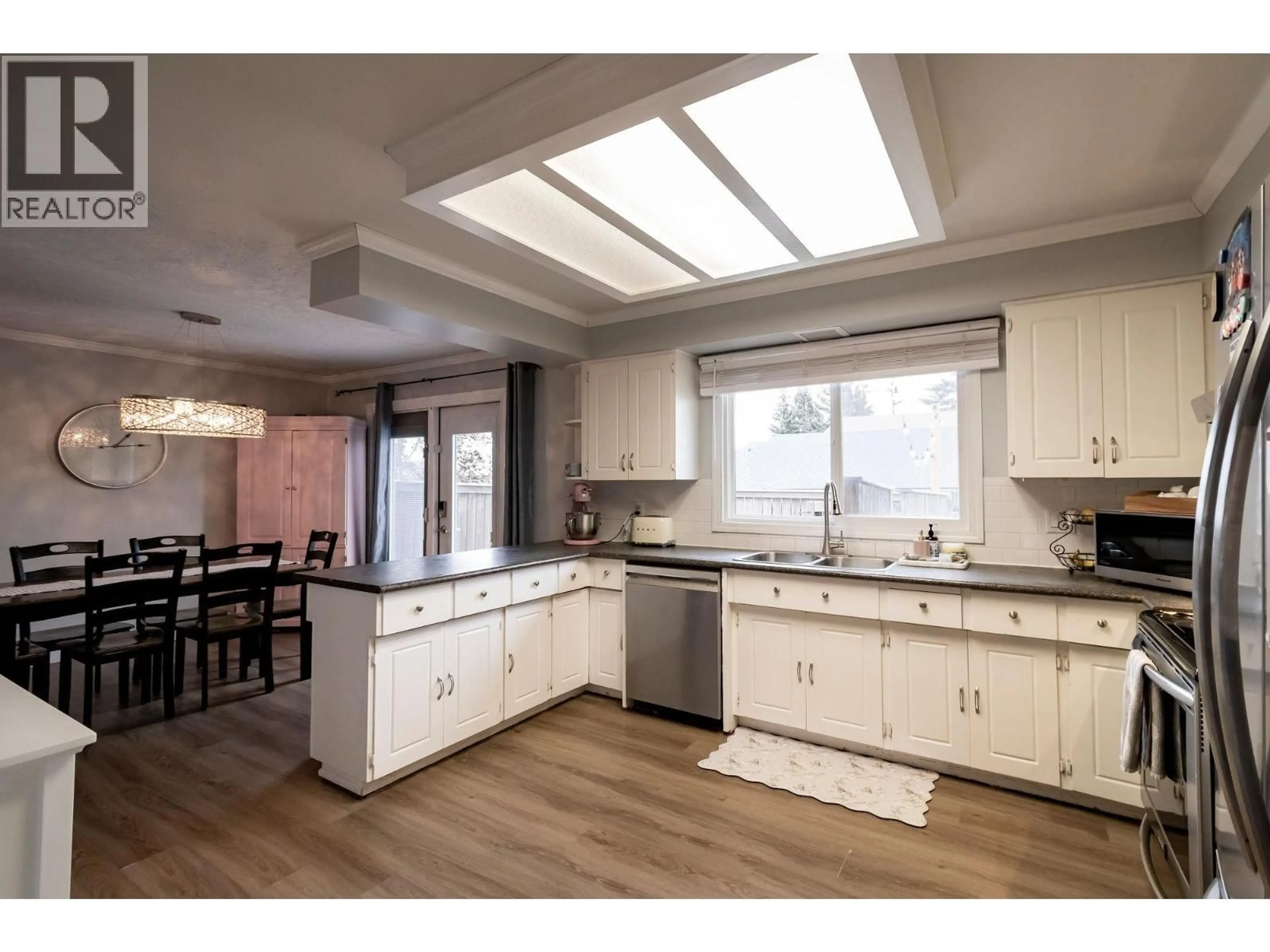 Open concept kitchen, unknown for 9411 84 STREET, Fort St. John British Columbia V1J6C6
