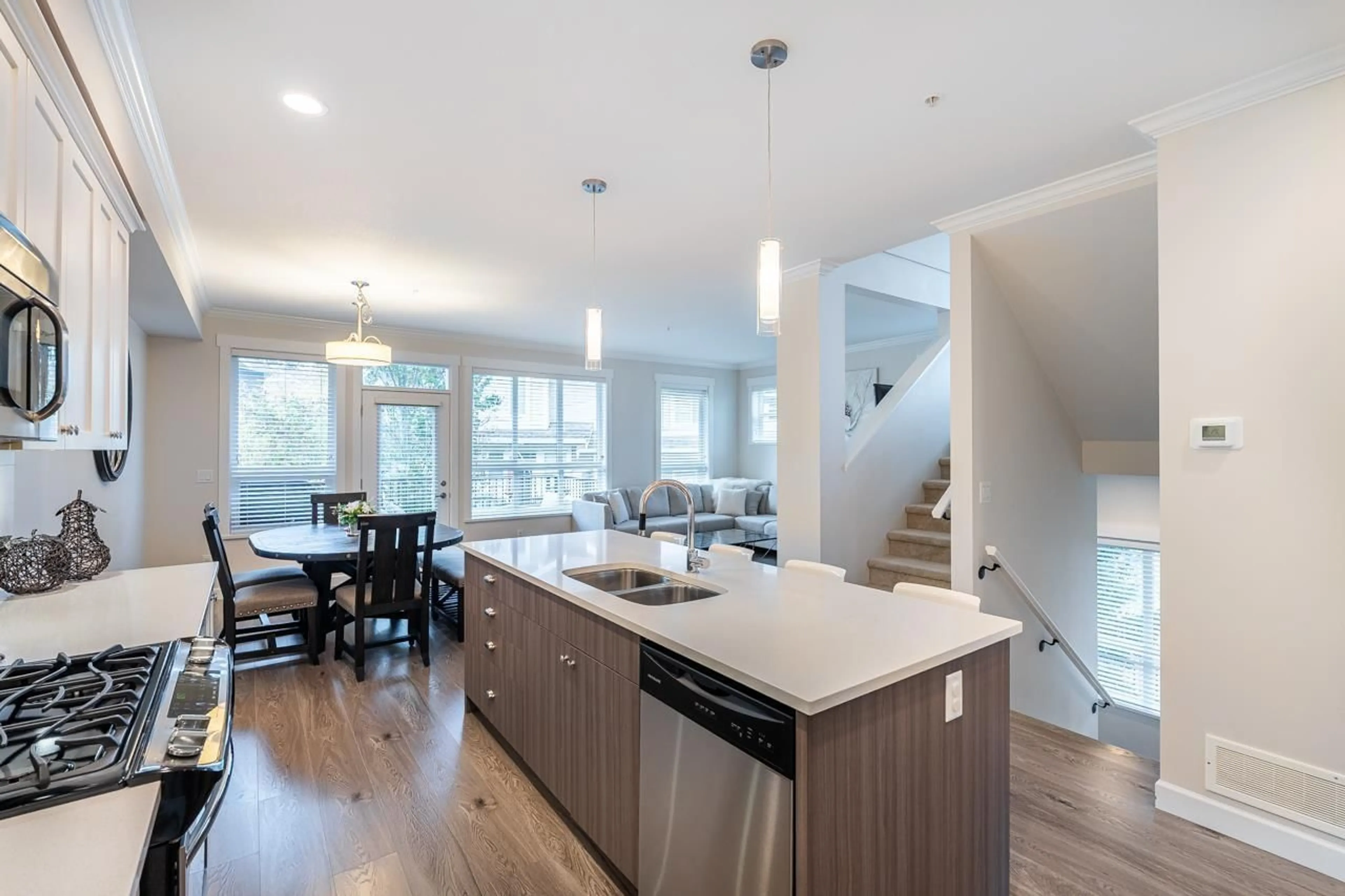 Open concept kitchen, wood/laminate floor for 24 - 7059 210 STREET, Langley British Columbia V2Y0T2