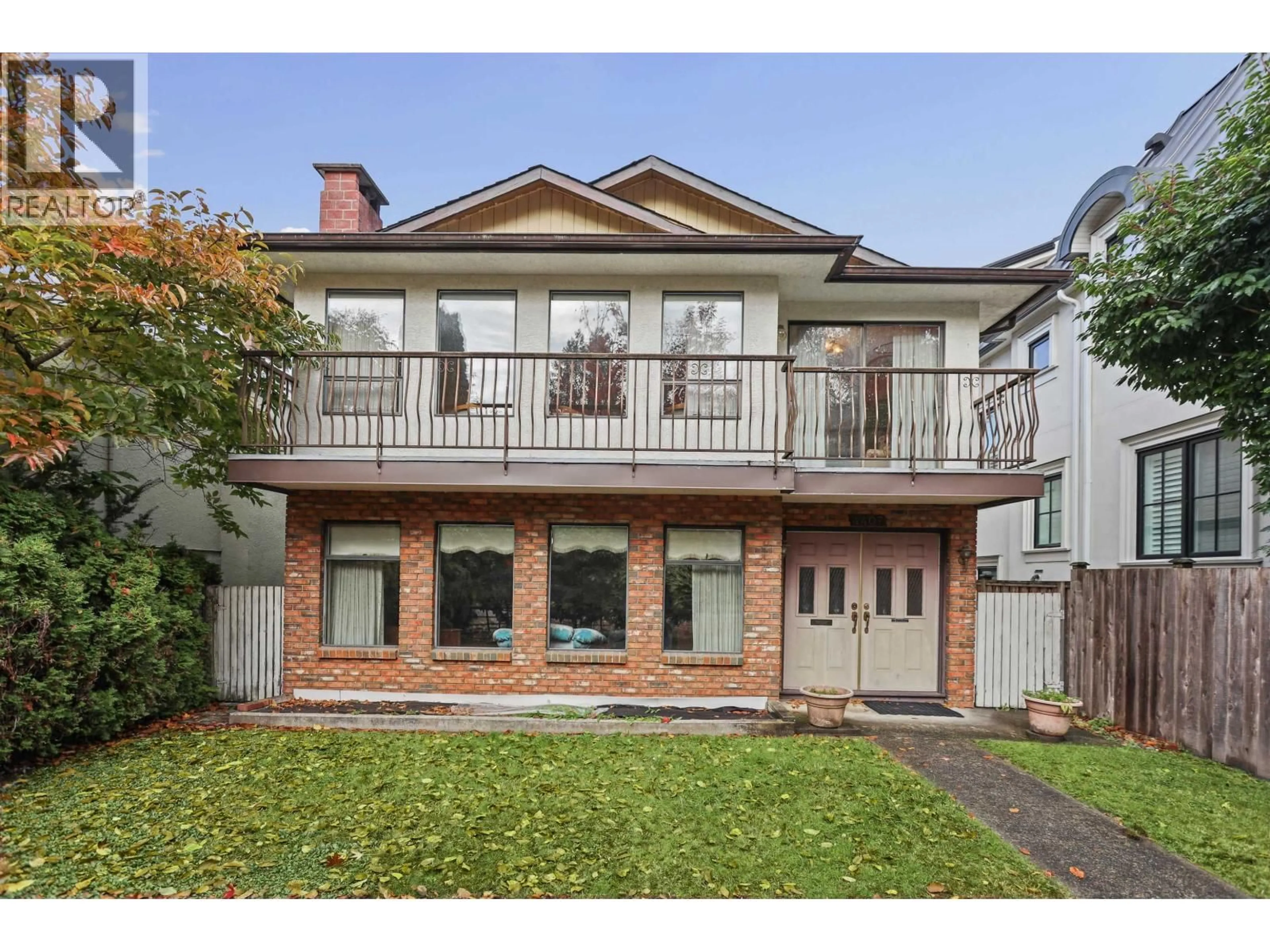 Home with brick exterior material, street for 4407 13TH AVENUE, Vancouver British Columbia V6R2V2