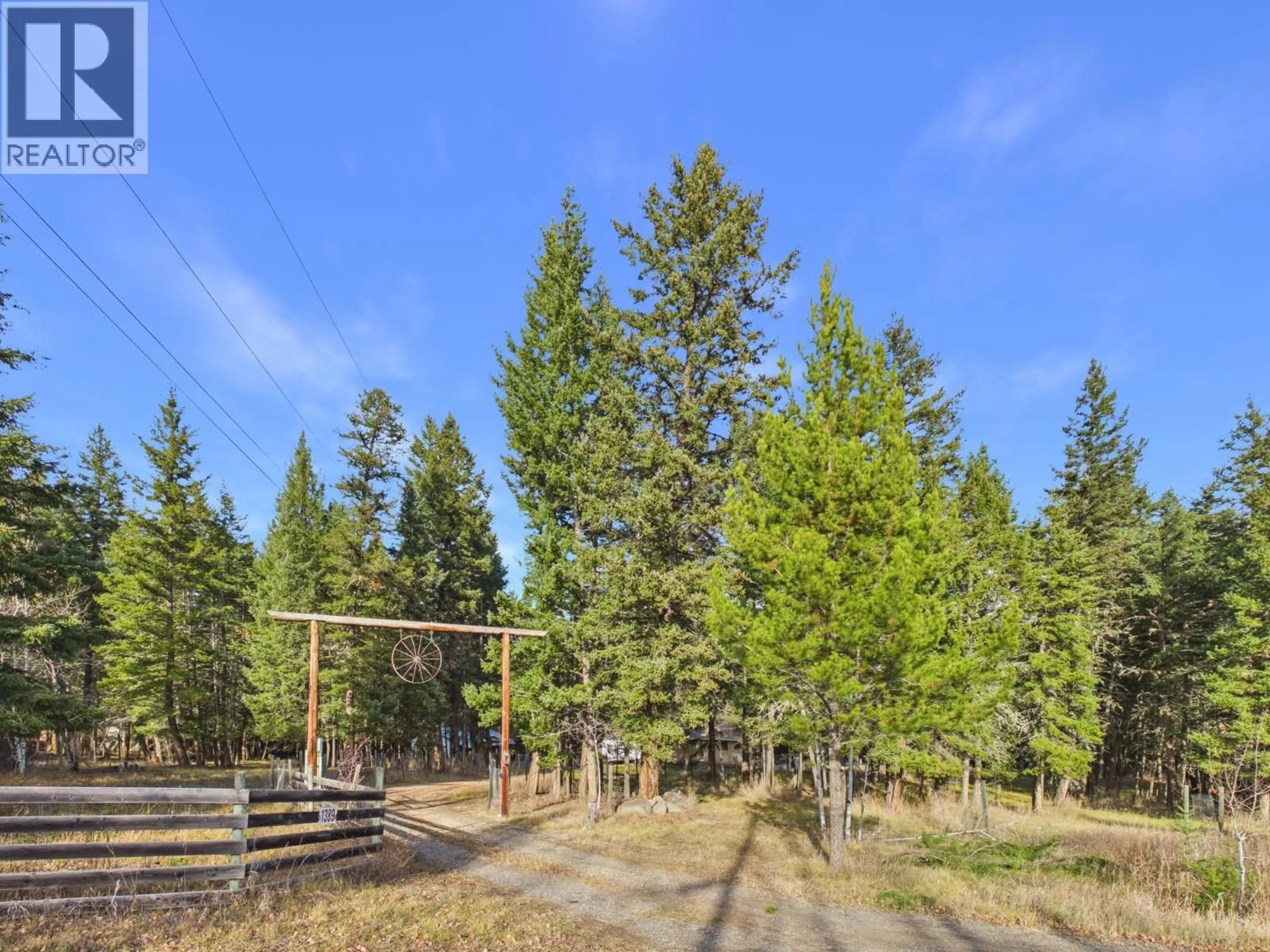 A pic from outside/outdoor area/front of a property/back of a property/a pic from drone, forest/trees view for 1389 FLETT ROAD, Williams Lake British Columbia V2G4W8