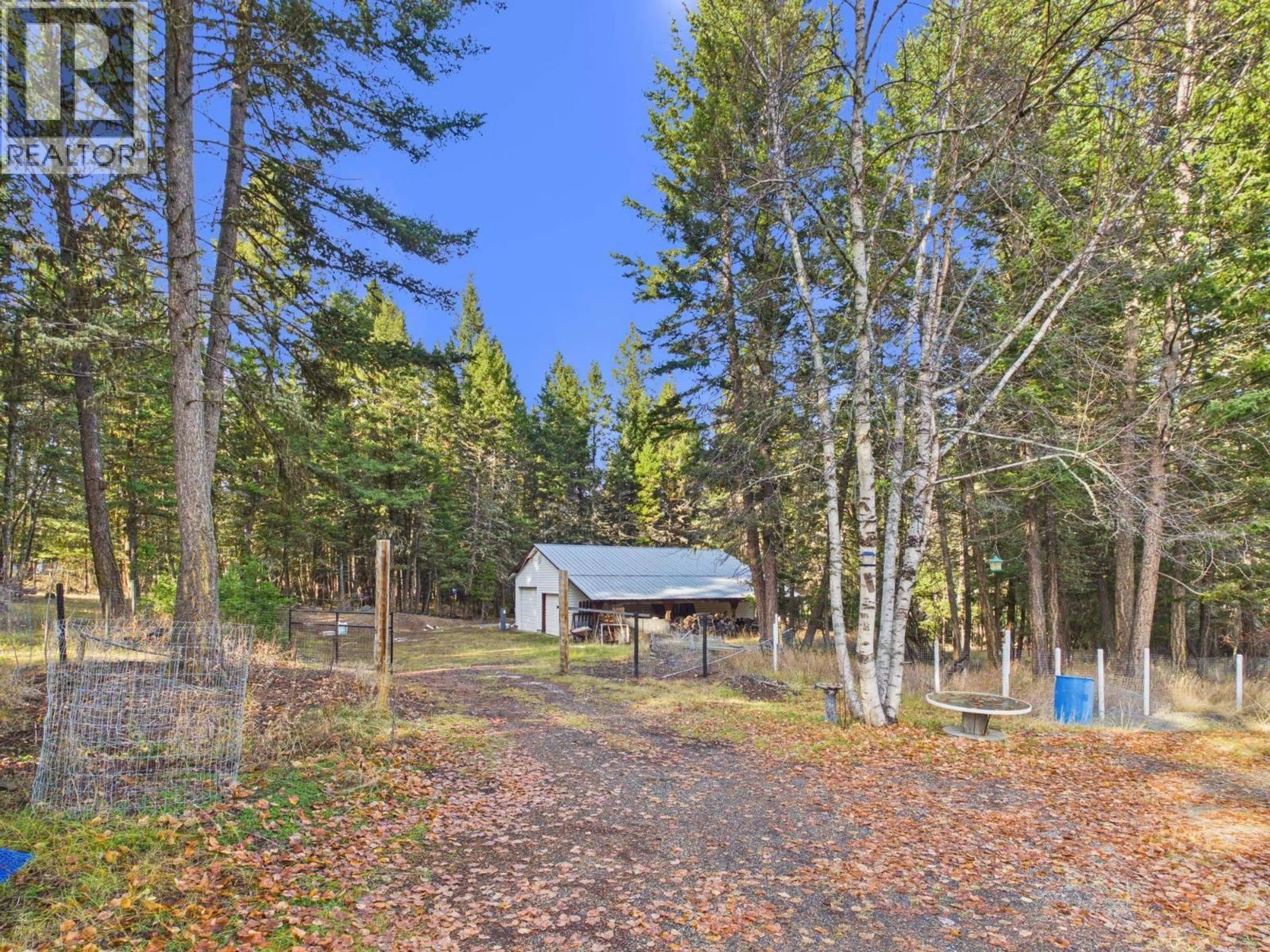 A pic from outside/outdoor area/front of a property/back of a property/a pic from drone, forest/trees view for 1389 FLETT ROAD, Williams Lake British Columbia V2G4W8
