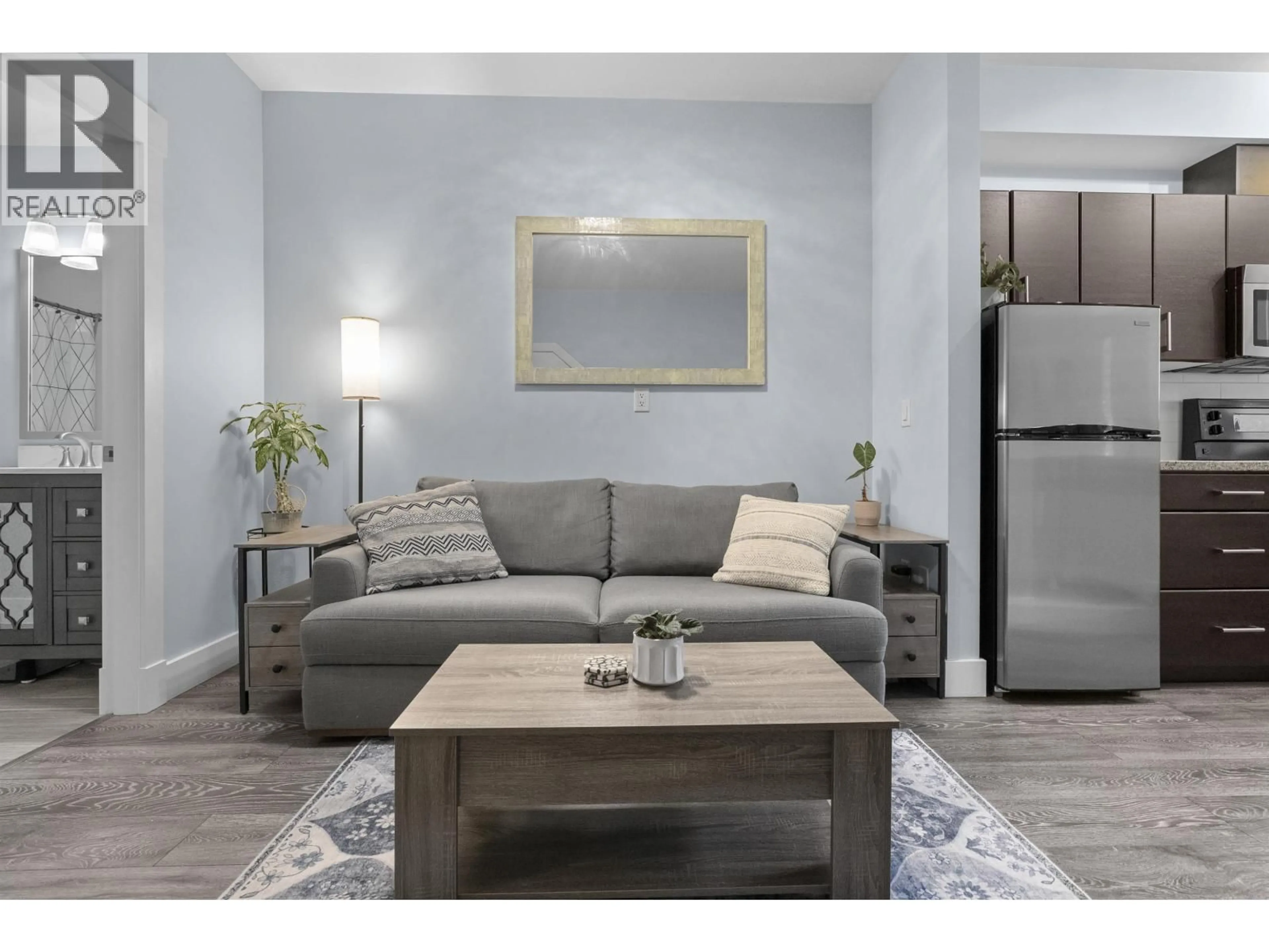 Living room with furniture, wood/laminate floor for 109 - 4808 LINDEN DRIVE, Delta British Columbia V4K0B5