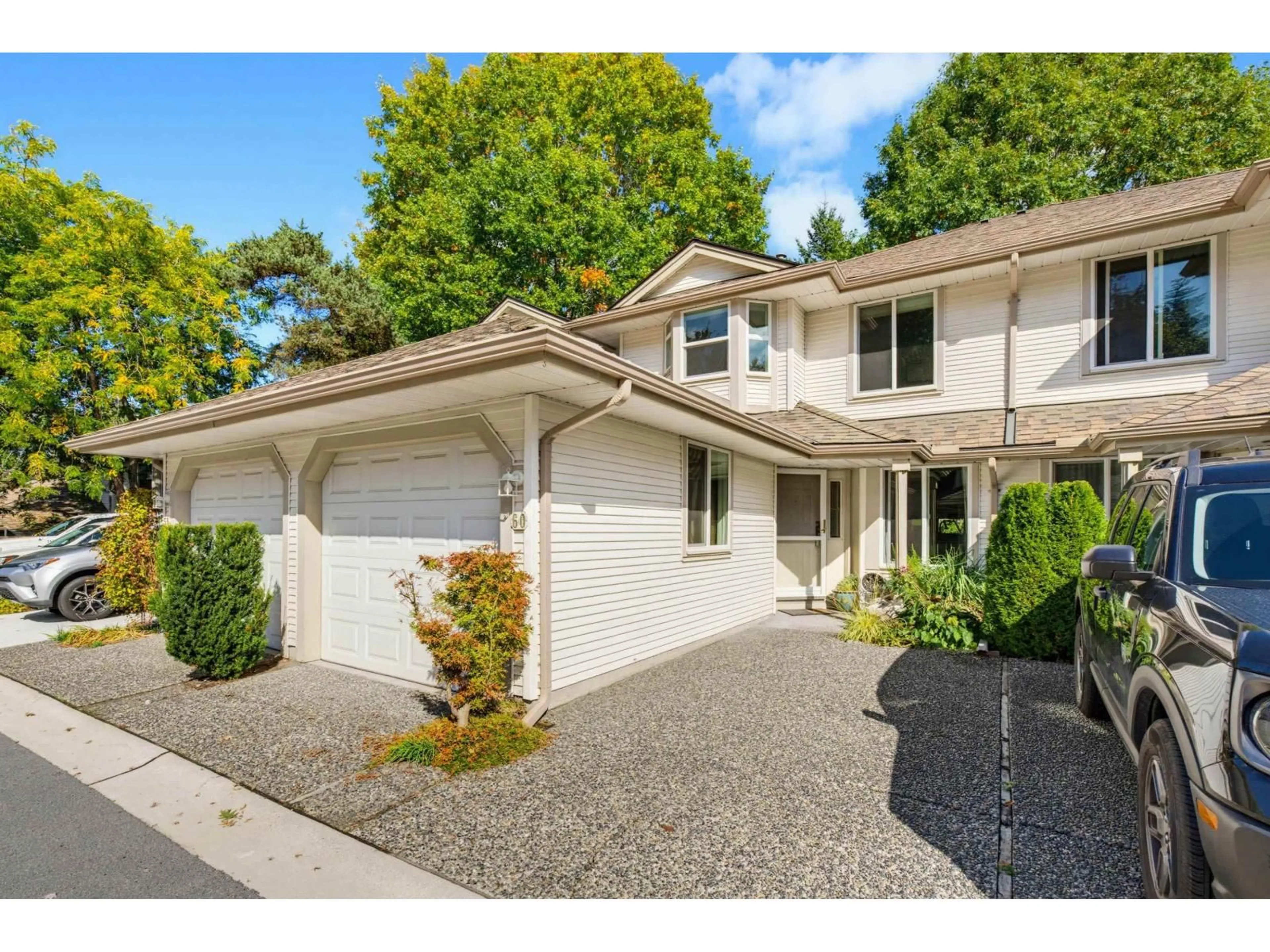 Home with vinyl exterior material, street for 60 - 9045 WALNUT GROVE DRIVE, Langley British Columbia V1M2E1