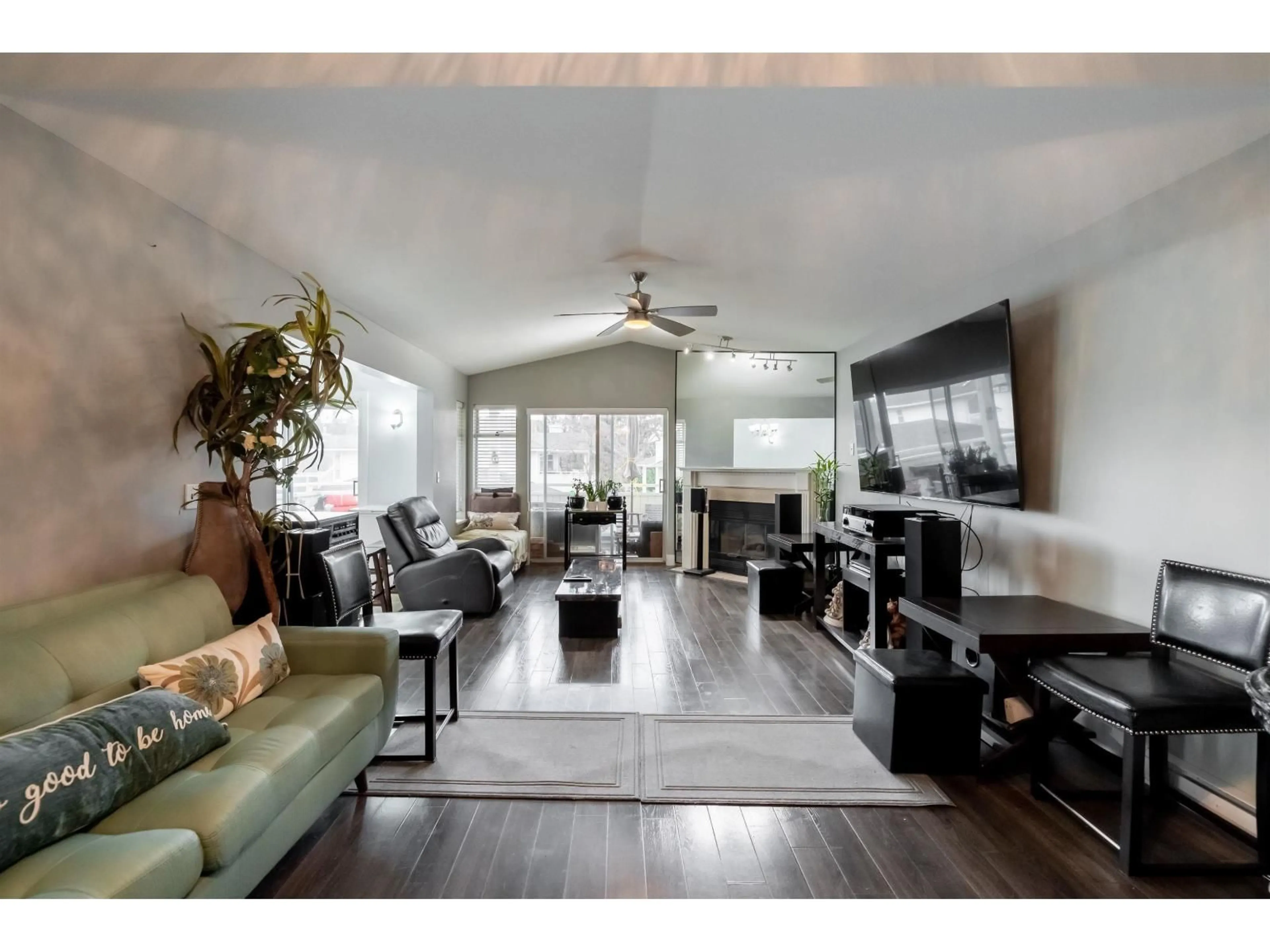 Living room with furniture, wood/laminate floor for 213 - 7156 121 STREET, Surrey British Columbia V3W0J6