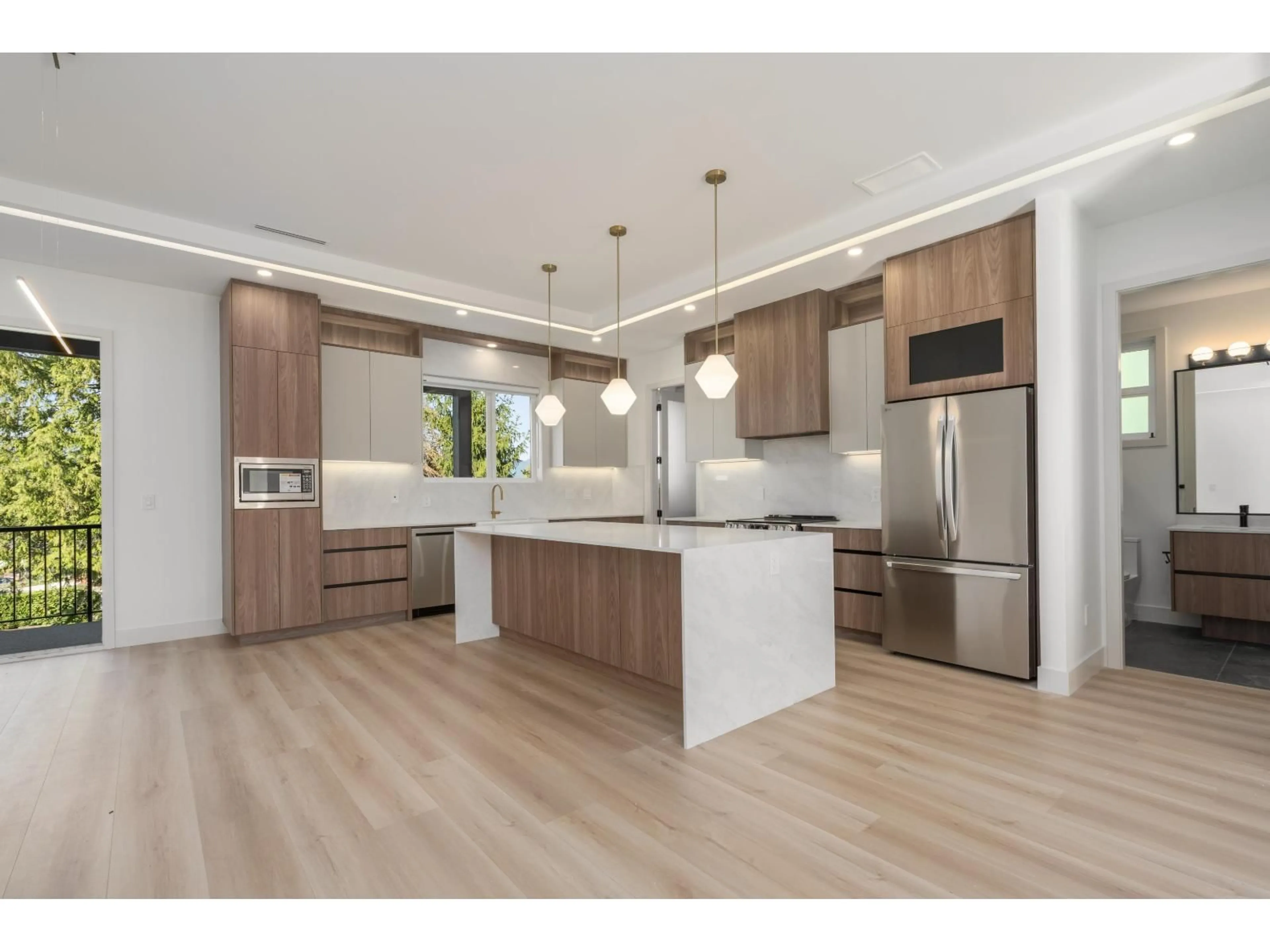 Open concept kitchen, wood/laminate floor for 14755 111A AVENUE, Surrey British Columbia V3R2E2