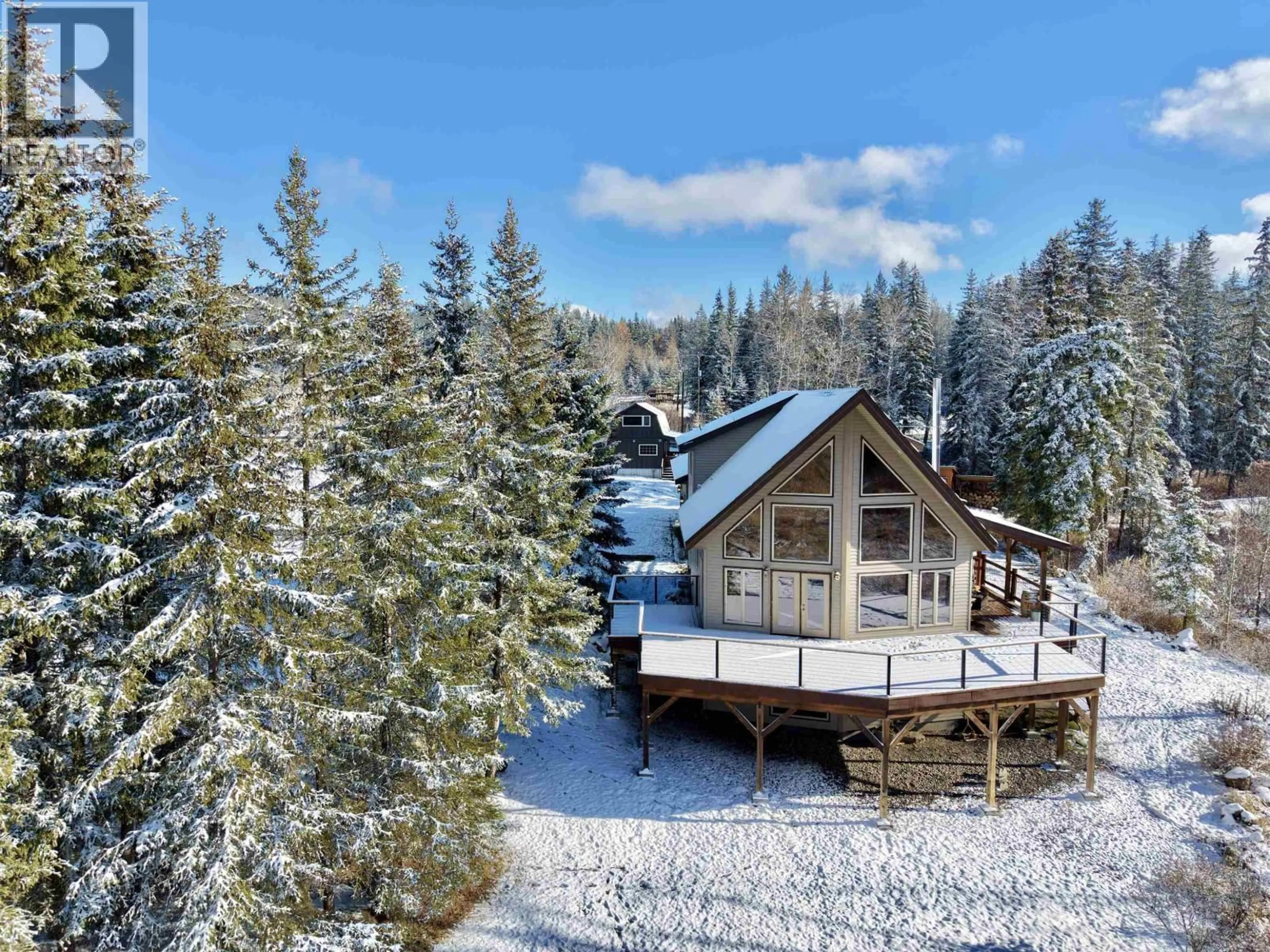 A pic from outside/outdoor area/front of a property/back of a property/a pic from drone, unknown for 3722 SPOKIN LAKE ROAD, 150 Mile House British Columbia V0K2G0