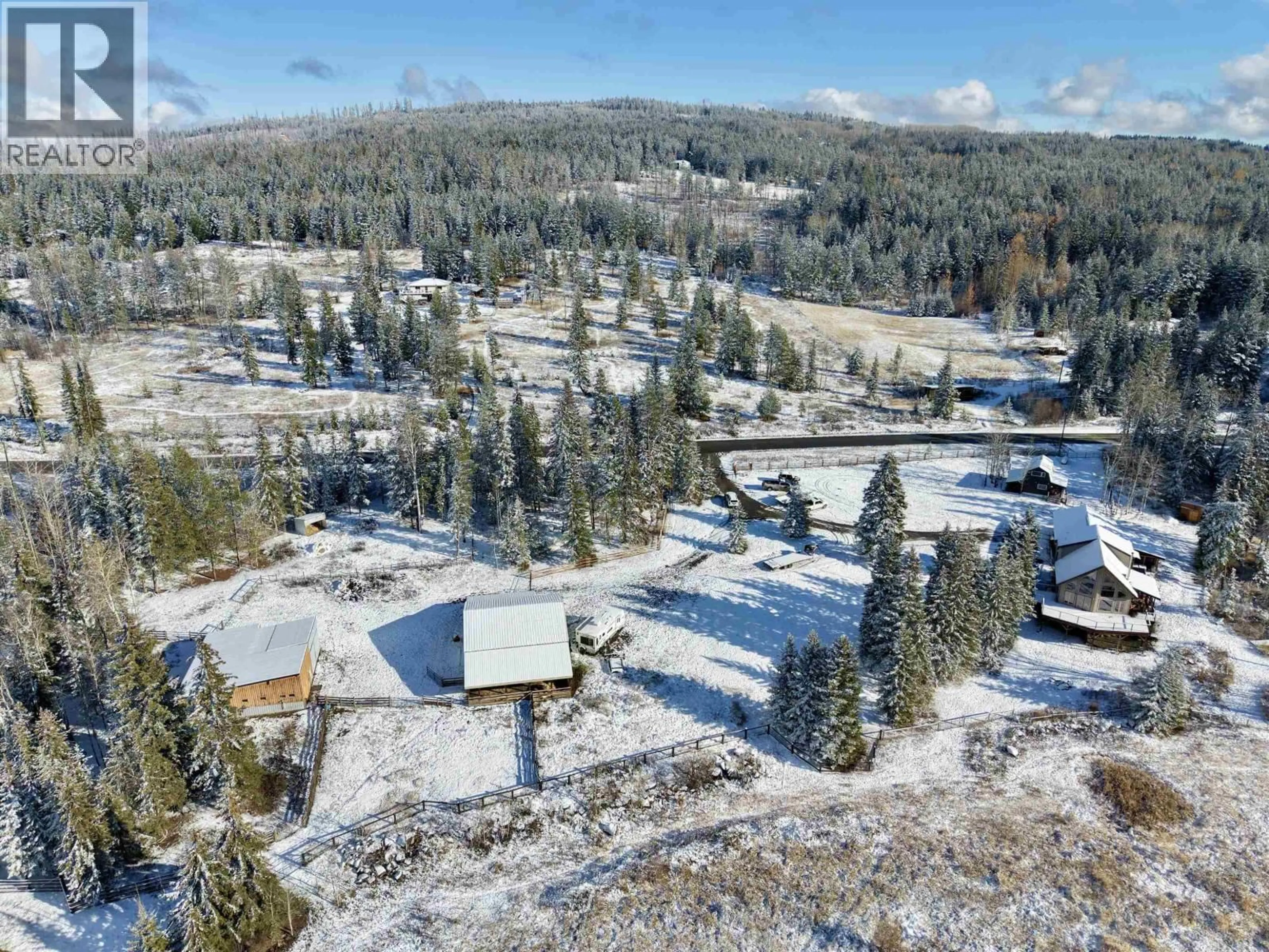 A pic from outside/outdoor area/front of a property/back of a property/a pic from drone, forest/trees view for 3722 SPOKIN LAKE ROAD, 150 Mile House British Columbia V0K2G0