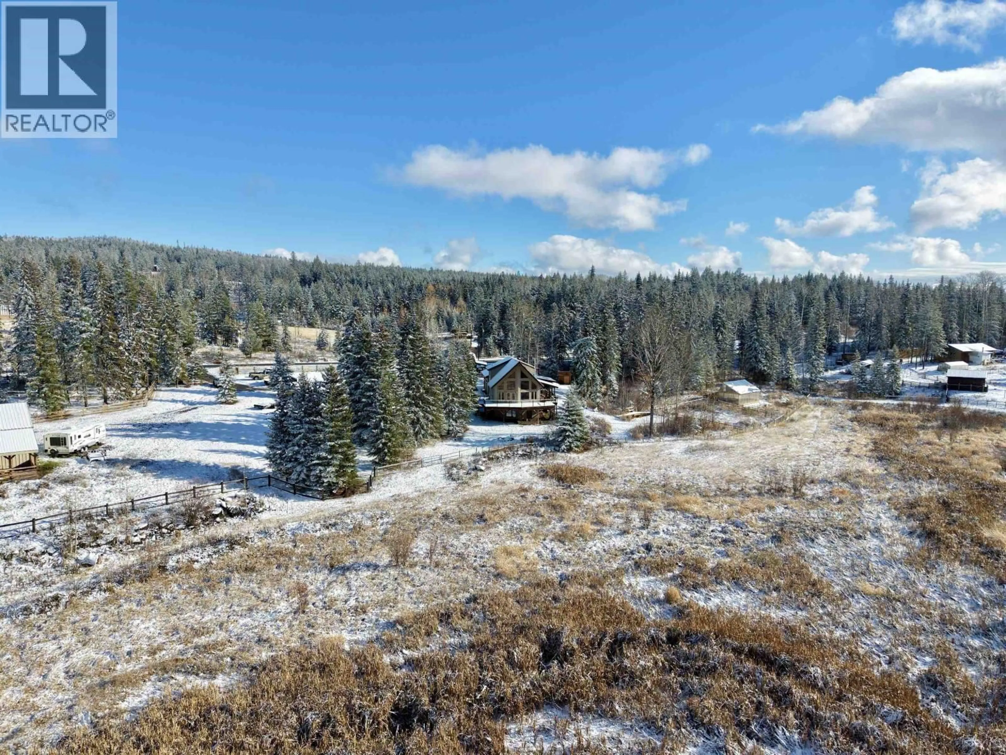 A pic from outside/outdoor area/front of a property/back of a property/a pic from drone, mountain view for 3722 SPOKIN LAKE ROAD, 150 Mile House British Columbia V0K2G0