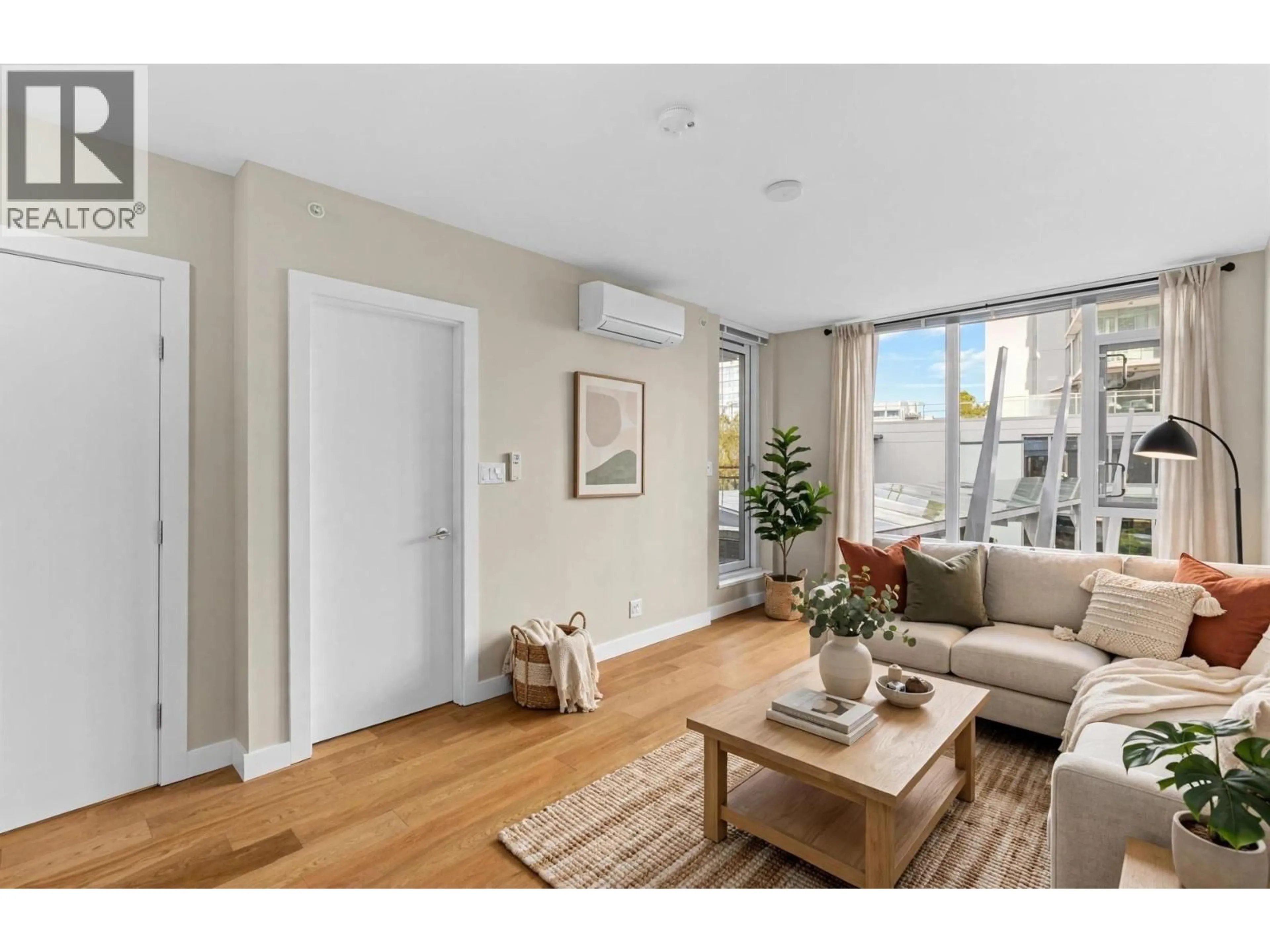 Living room with furniture, unknown for 610 - 6951 ELMBRIDGE WAY, Richmond British Columbia V7C0A4