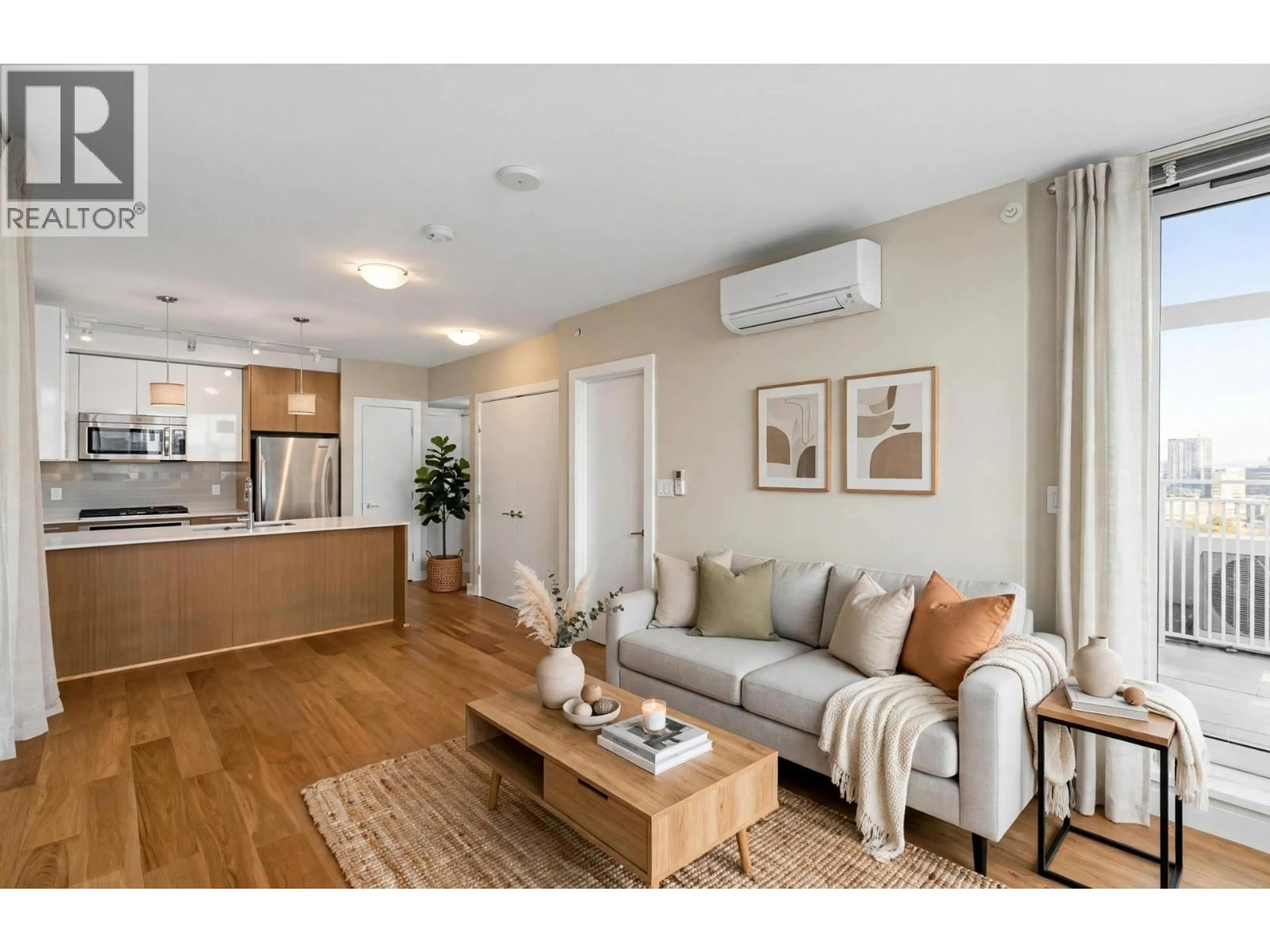 Living room with furniture, wood/laminate floor for 610 - 6951 ELMBRIDGE WAY, Richmond British Columbia V7C0A4