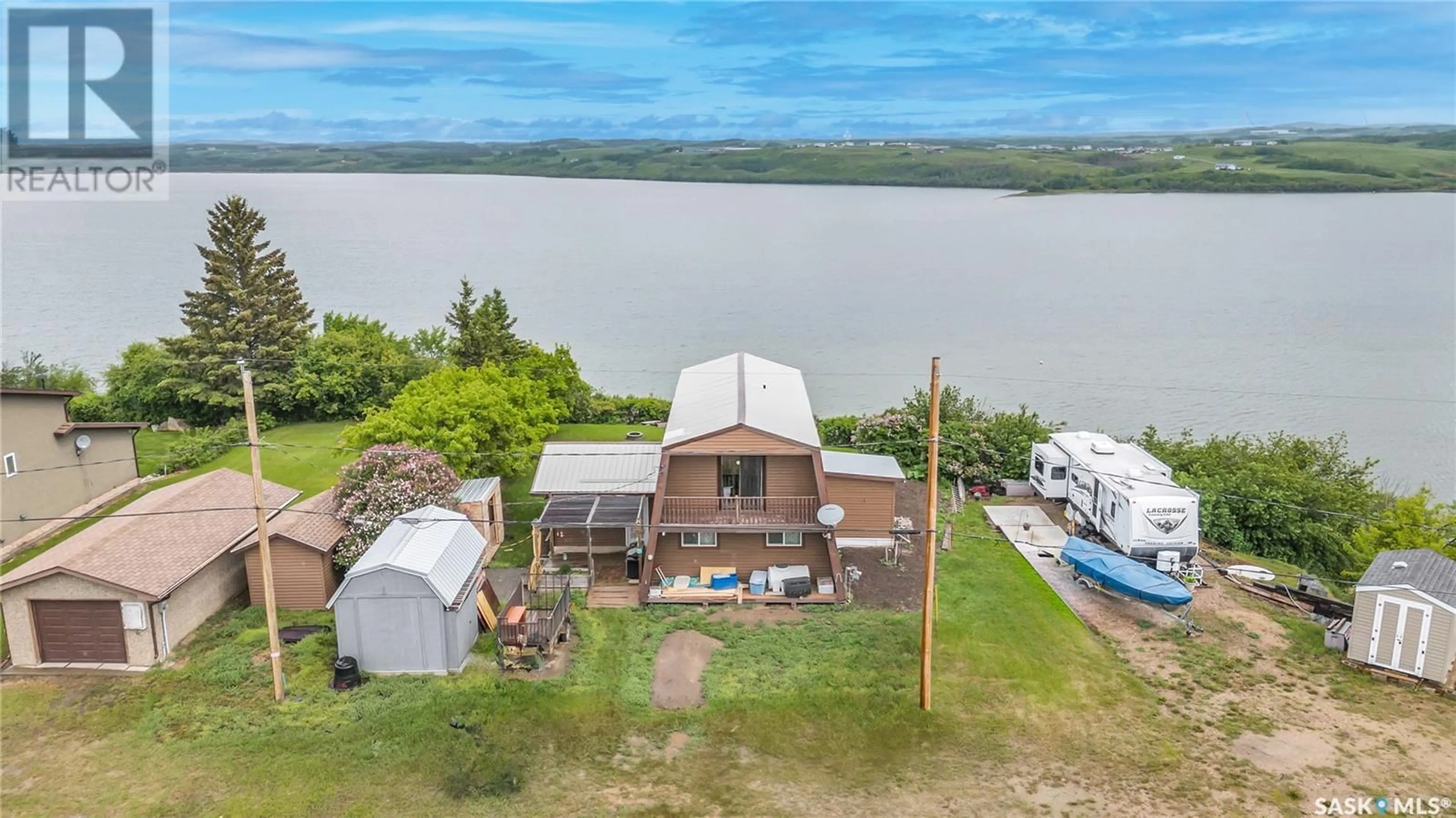 A pic from outside/outdoor area/front of a property/back of a property/a pic from drone, water/lake/river/ocean view for 11 SLEEPY HOLLOW ROAD, Murray Lake Saskatchewan S0M0L0