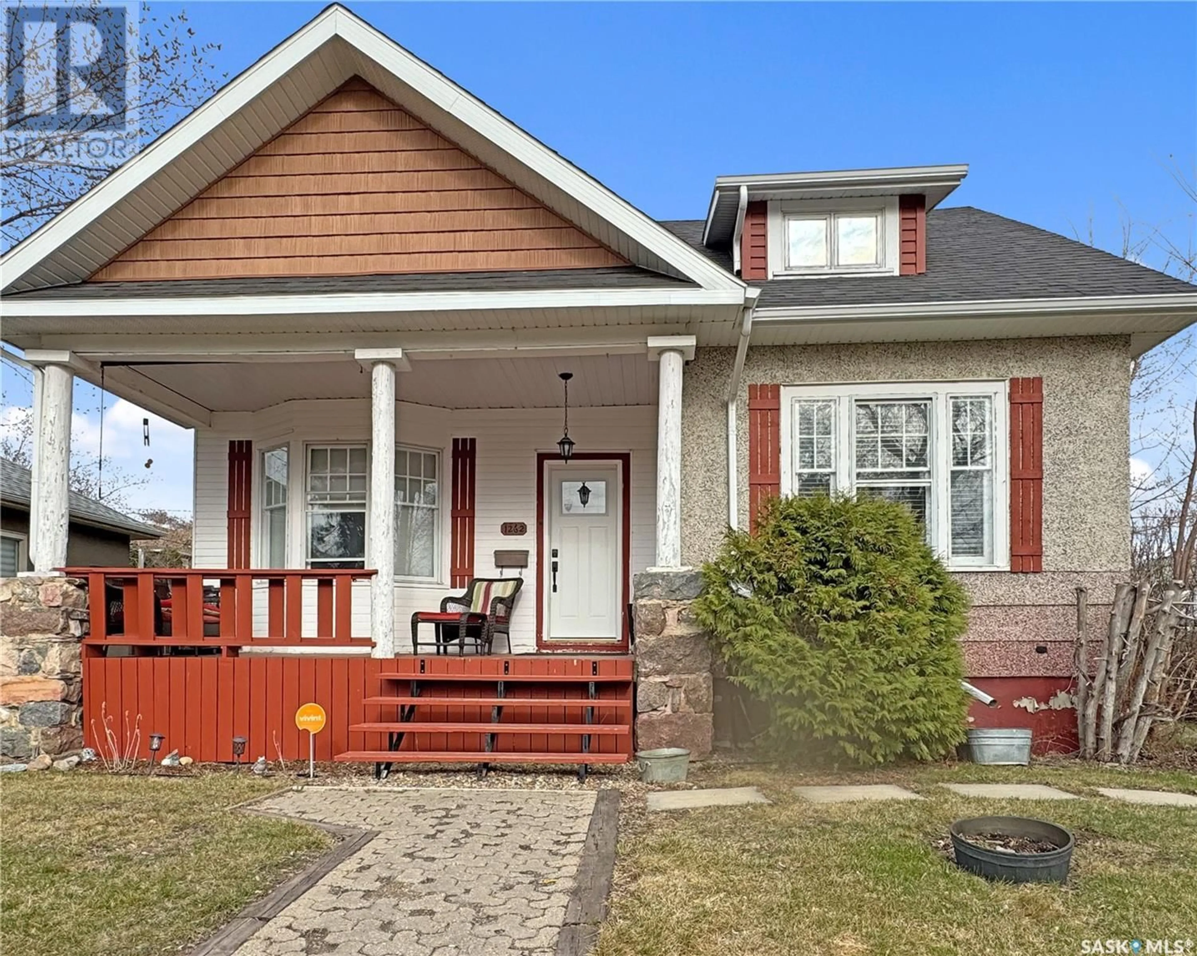 Home with brick exterior material, street for 1262 97TH STREET, North Battleford Saskatchewan S9A0J7