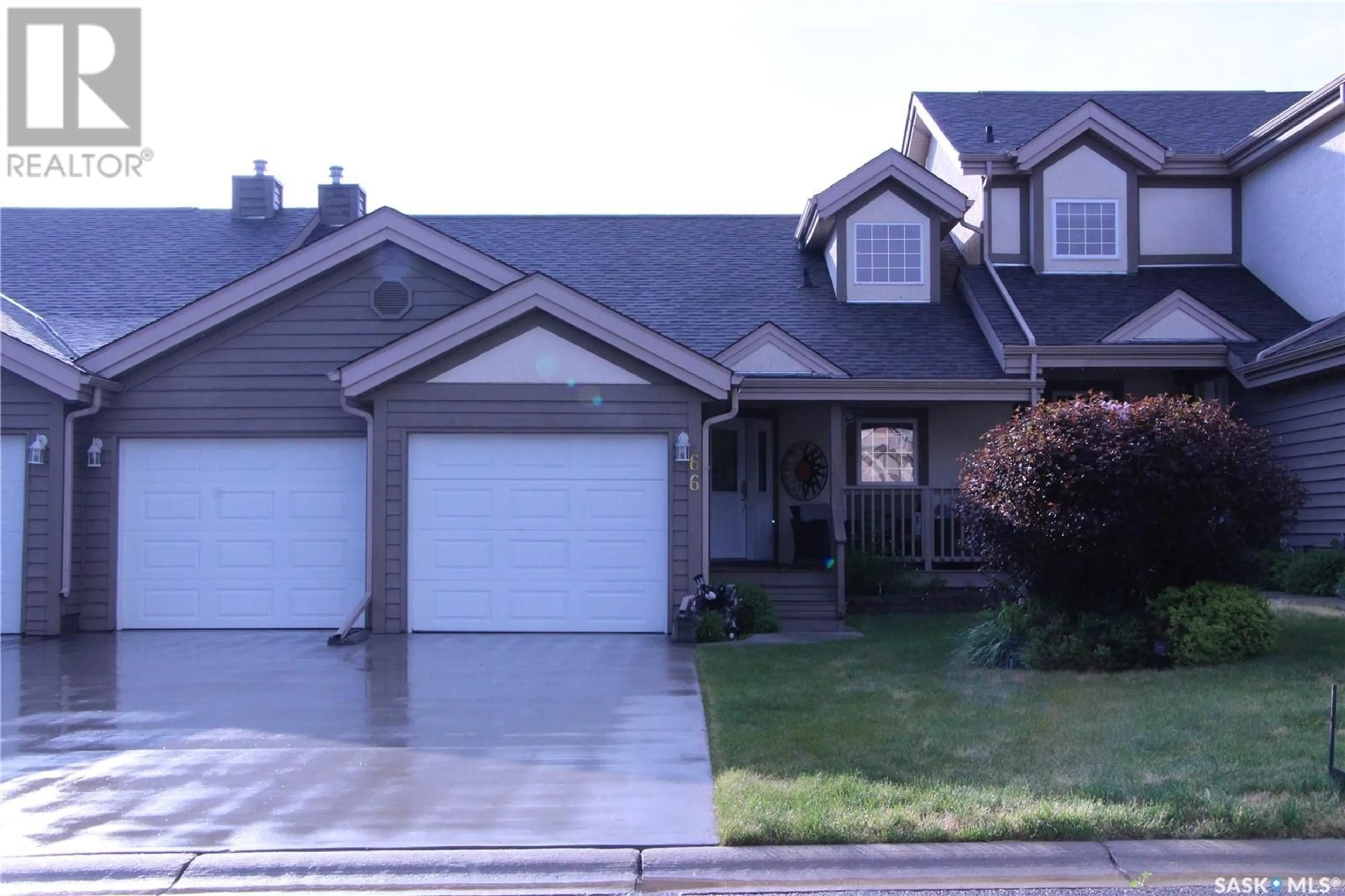 Home with vinyl exterior material, street for 66 EAGLE VIEW WAY, Elk Ridge Saskatchewan S0J2Y0