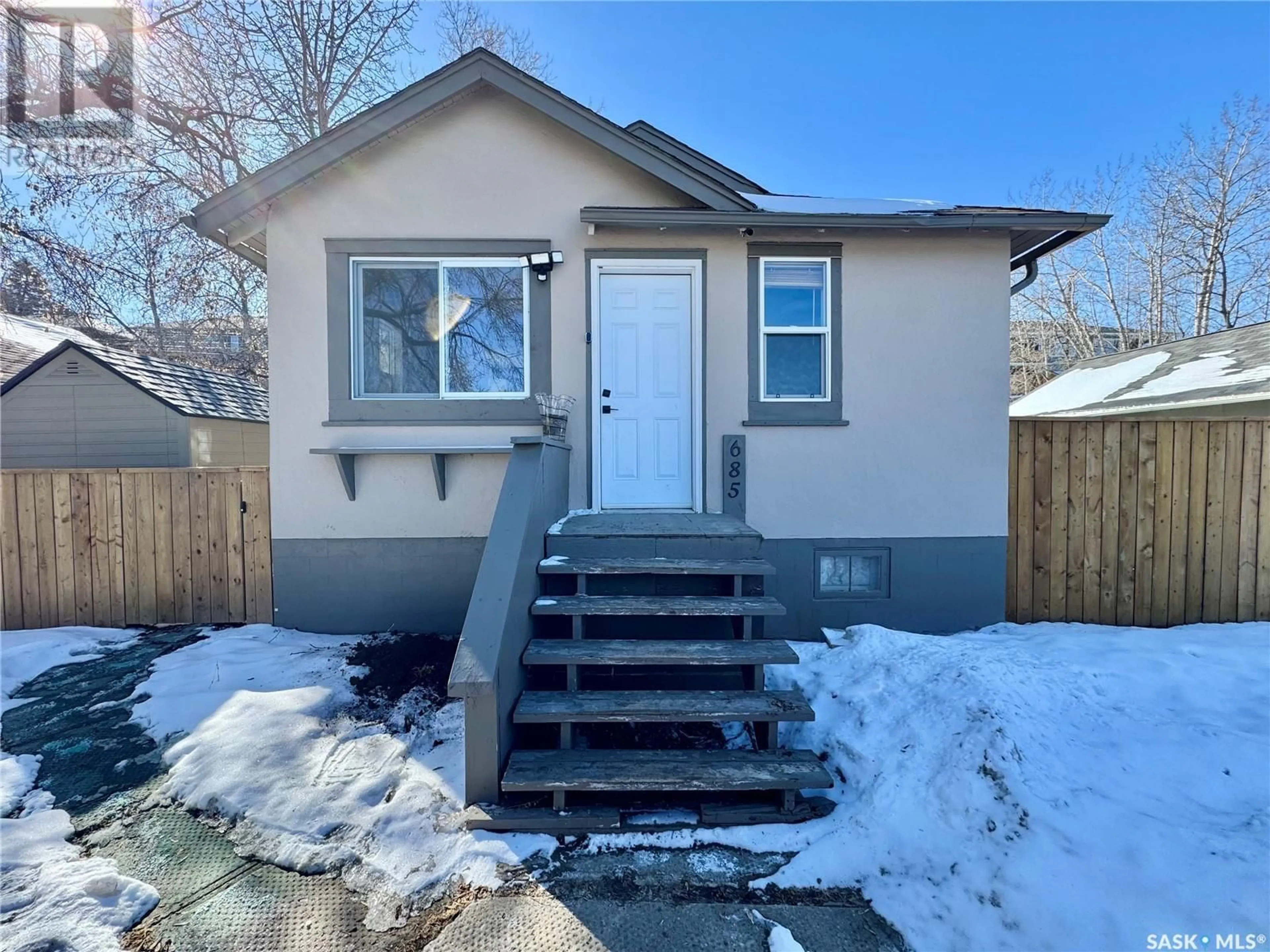 Home with vinyl exterior material, street for 685 18TH STREET, Prince Albert Saskatchewan S6V4A7