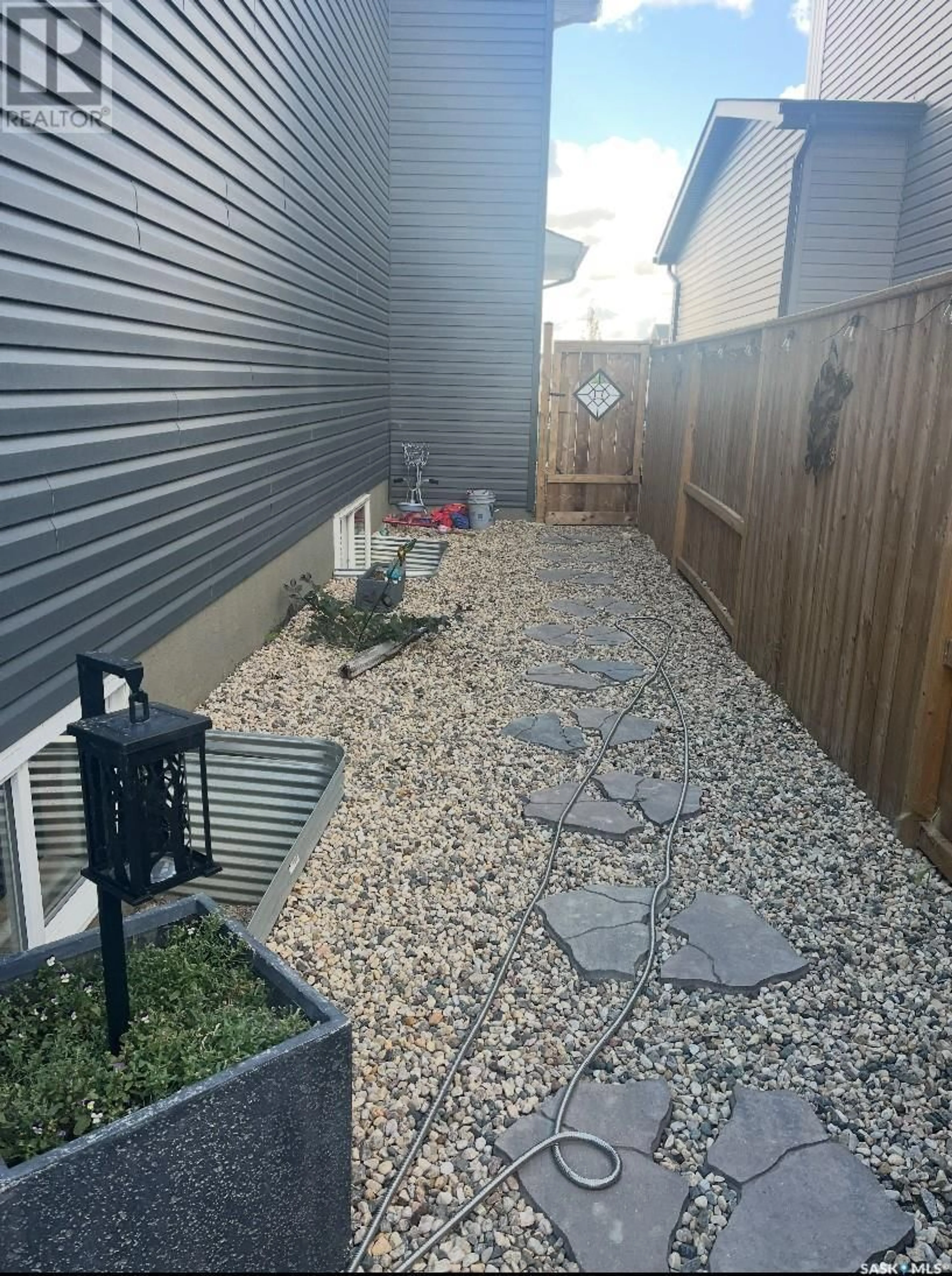 Patio, street for 215 SKOPIK CRESCENT, Saskatoon Saskatchewan S7V0V7