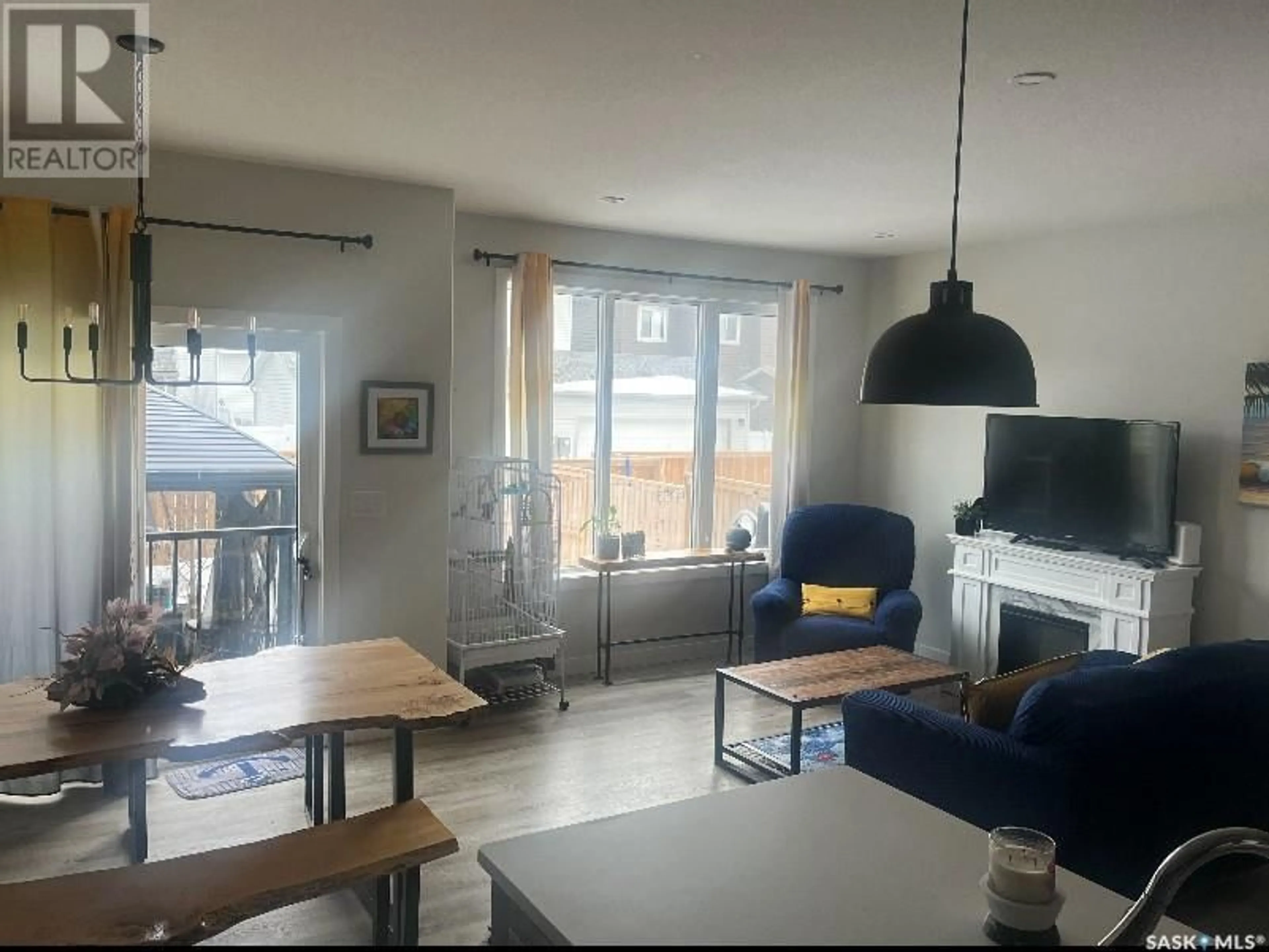 Living room with furniture, unknown for 215 SKOPIK CRESCENT, Saskatoon Saskatchewan S7V0V7
