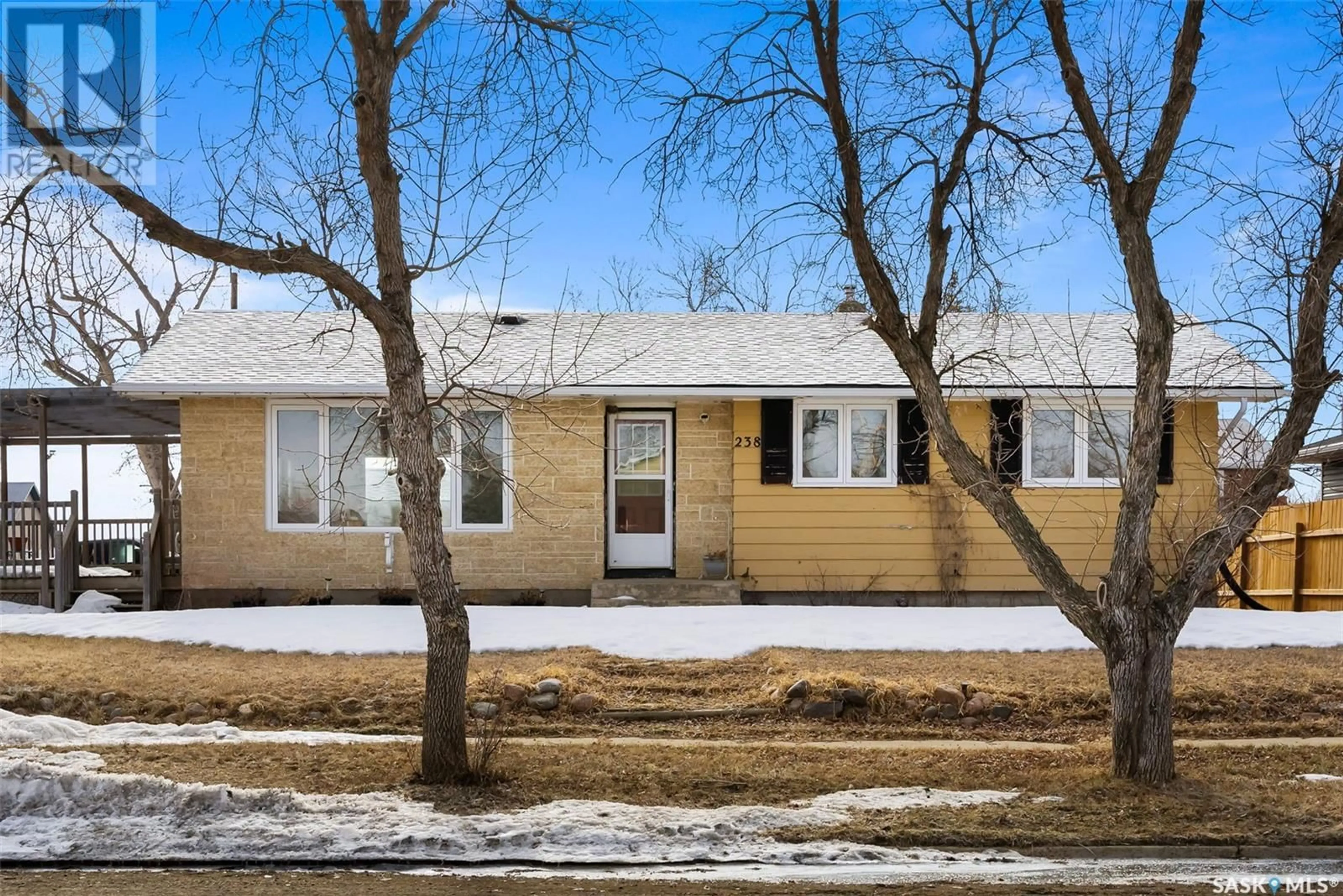Home with vinyl exterior material, street for 238 QUEEN STREET, Milestone Saskatchewan S0G3L0