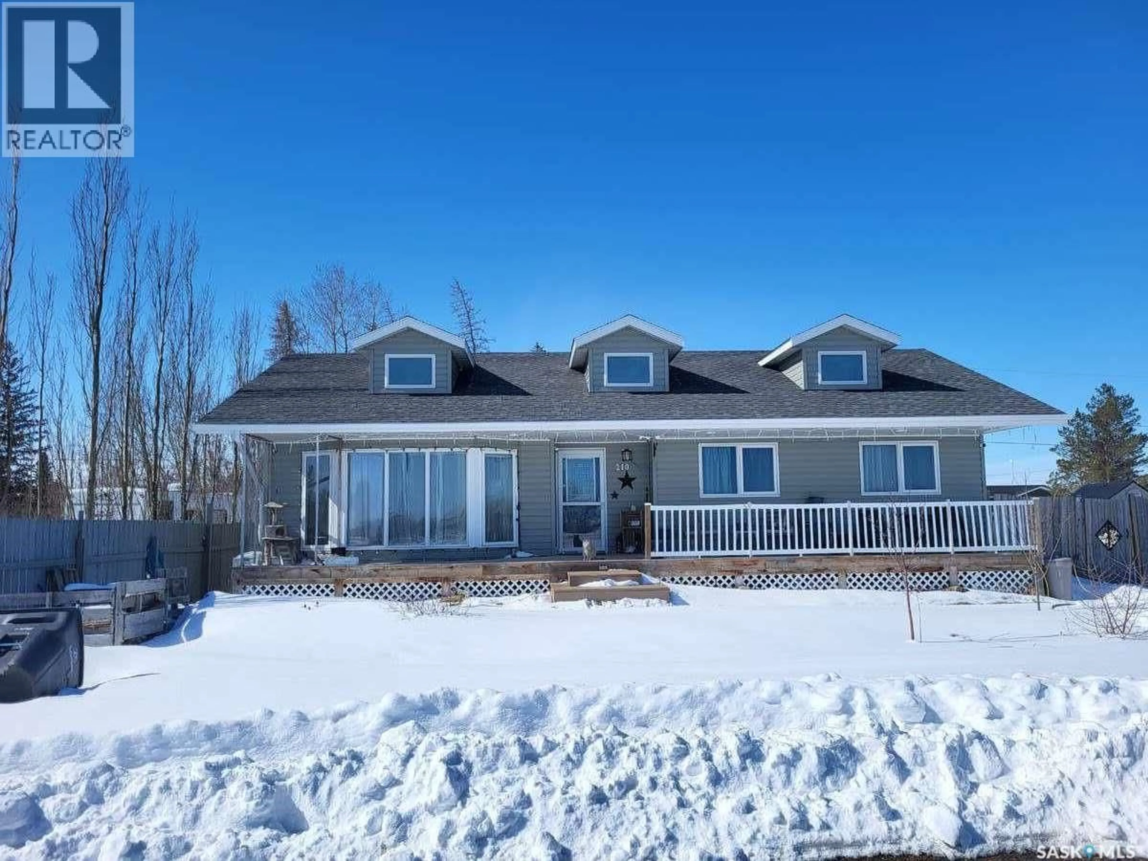 A pic from outside/outdoor area/front of a property/back of a property/a pic from drone, unknown for 210 DOUGLAS PLACE, Waseca Saskatchewan S0M3A0