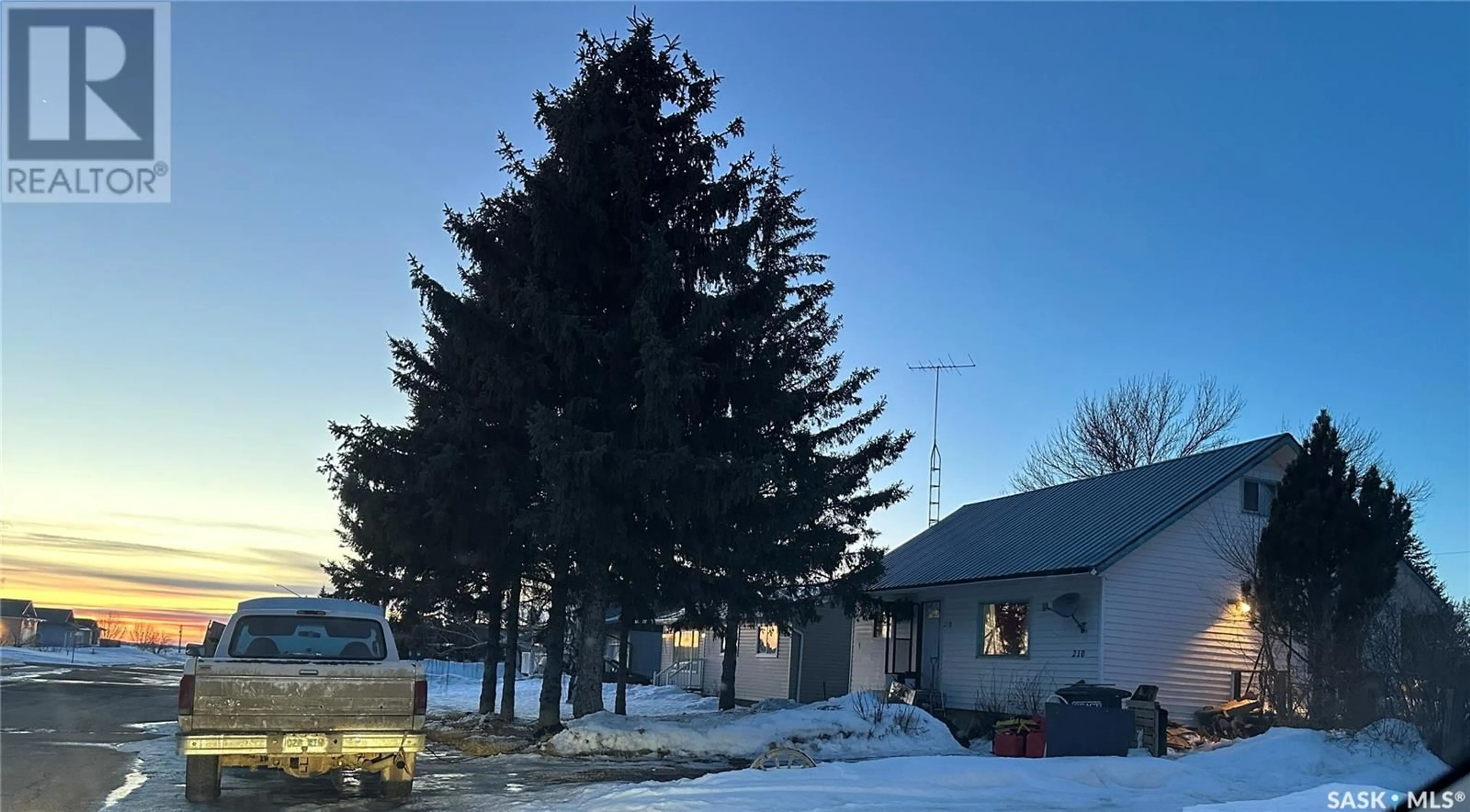 A pic from outside/outdoor area/front of a property/back of a property/a pic from drone, street for 210 7TH STREET, Wakaw Saskatchewan S0K4P0
