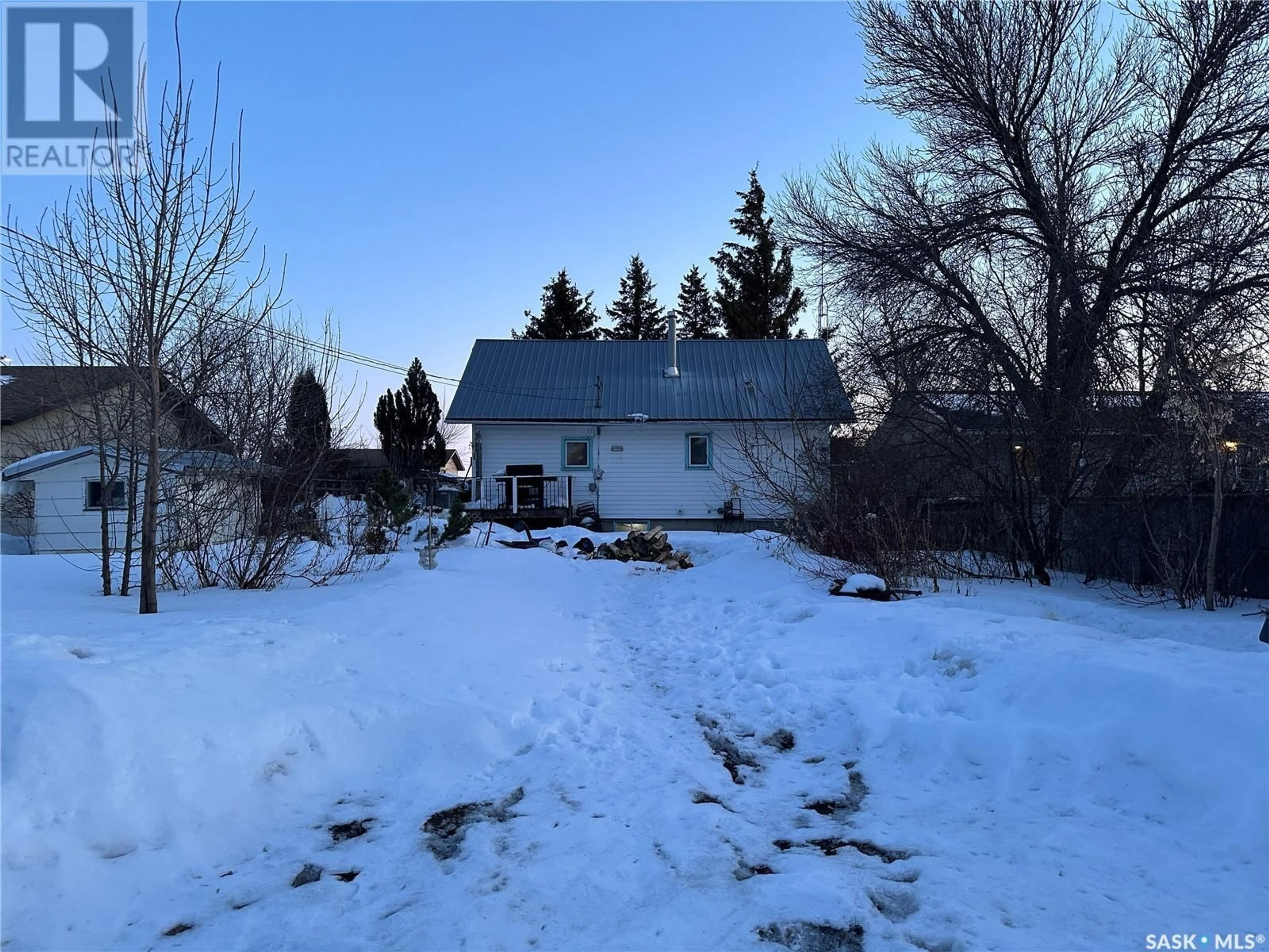A pic from outside/outdoor area/front of a property/back of a property/a pic from drone, street for 210 7TH STREET, Wakaw Saskatchewan S0K4P0