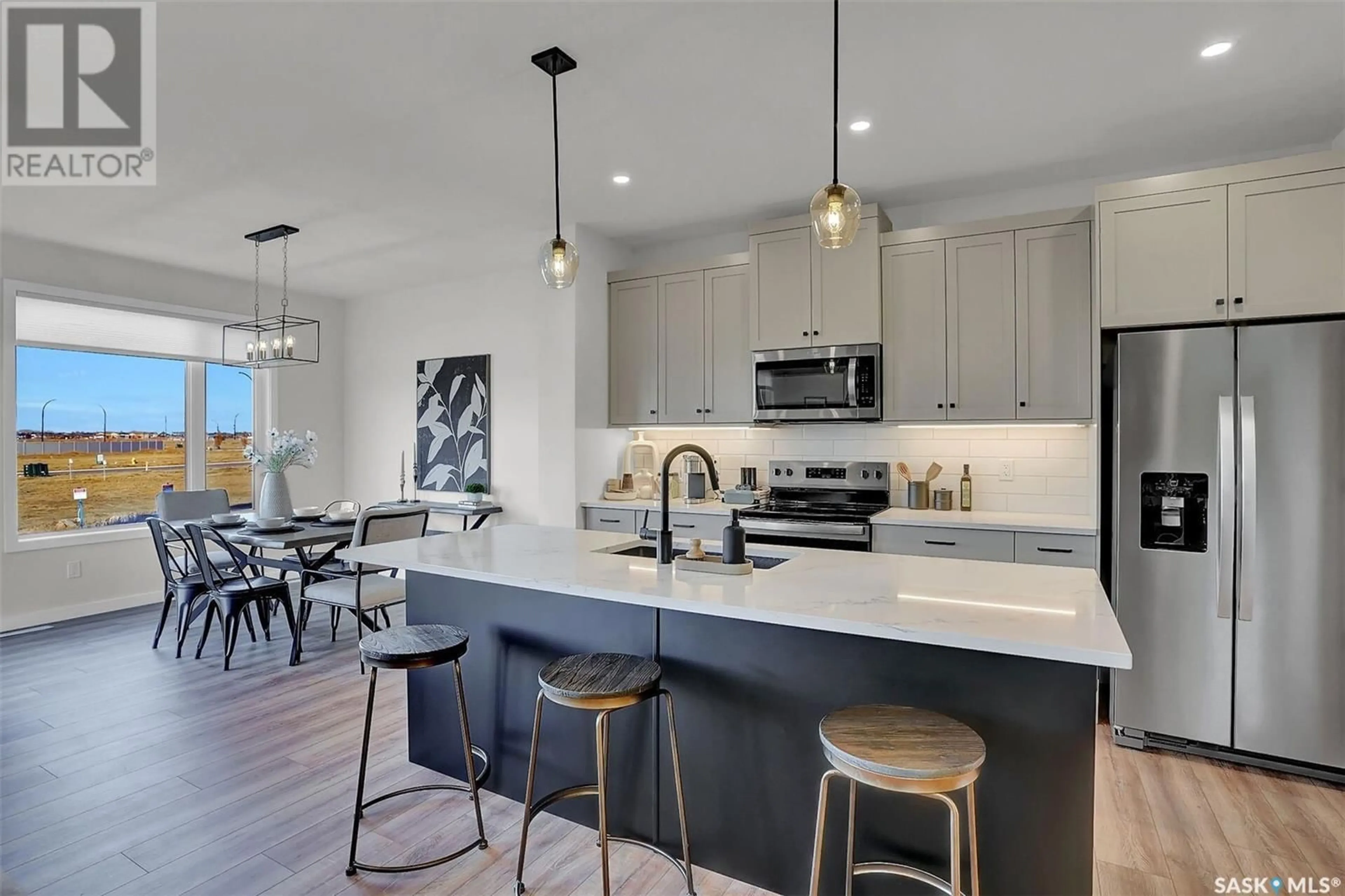 Open concept kitchen, ceramic/tile floor for 250 KATZ COURT, Saskatoon Saskatchewan S7V1S8
