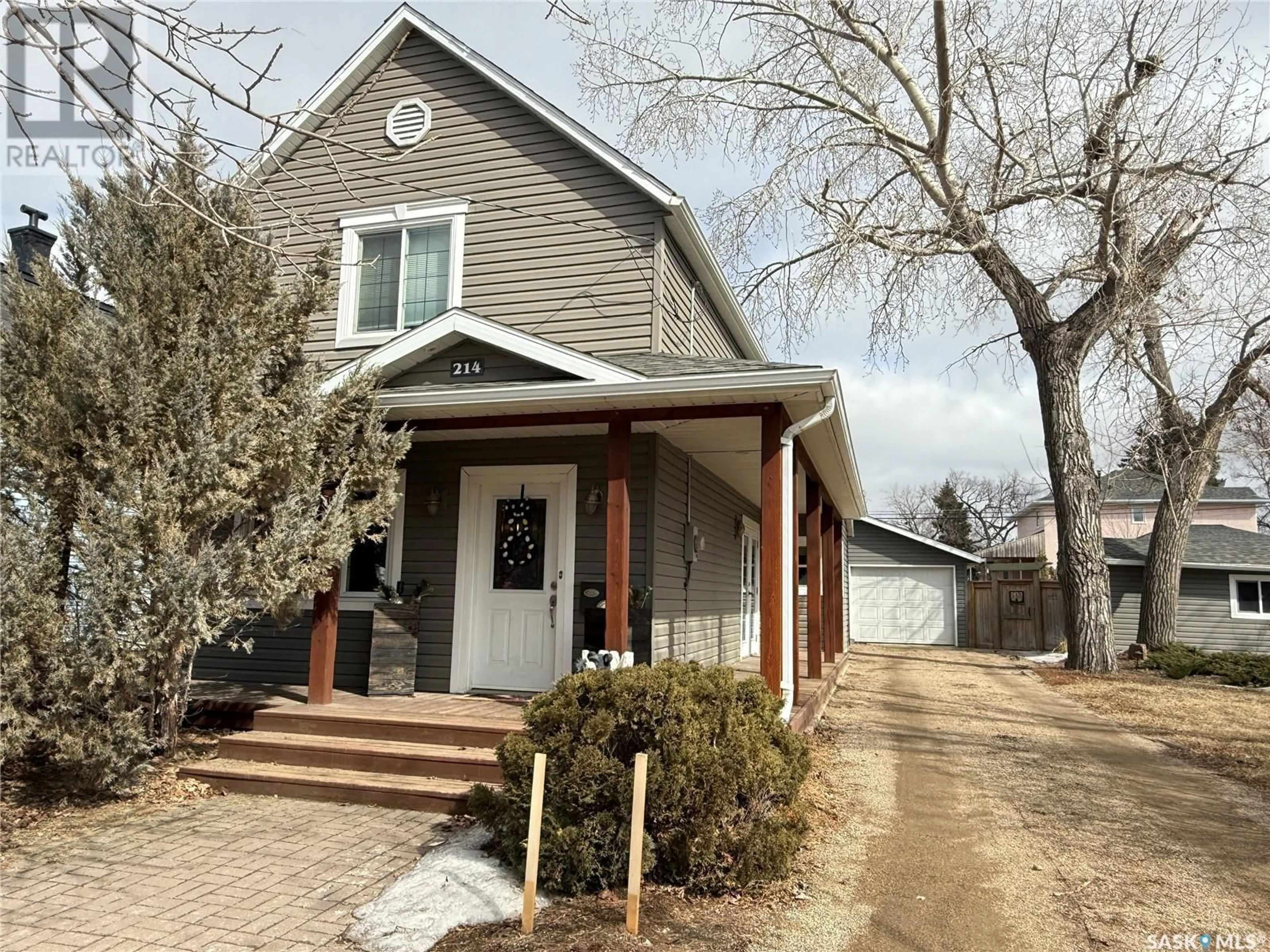 Home with brick exterior material, street for 214 3RD STREET, Weyburn Saskatchewan S4H2C3