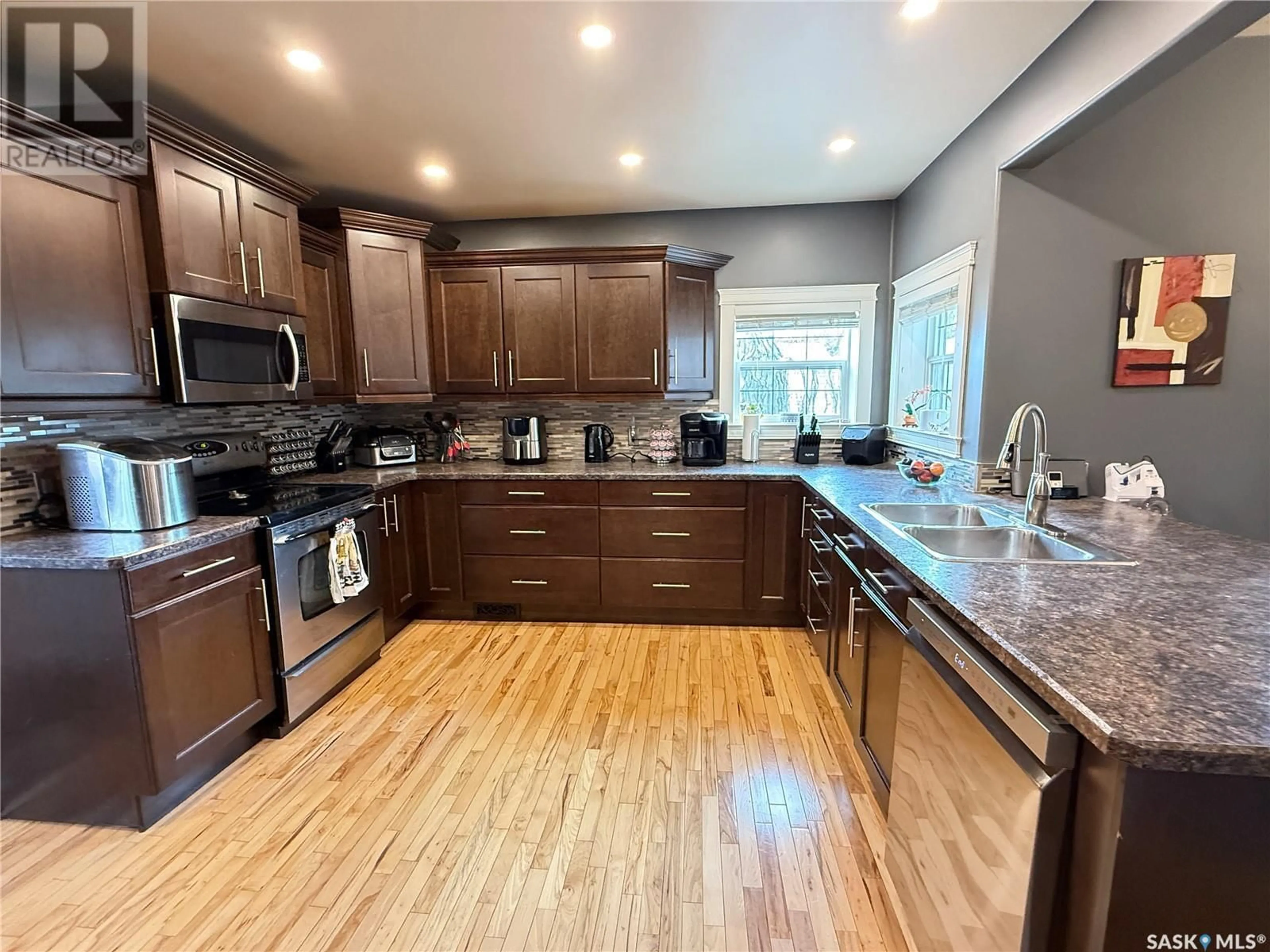 Open concept kitchen, unknown for 214 3RD STREET, Weyburn Saskatchewan S4H2C3