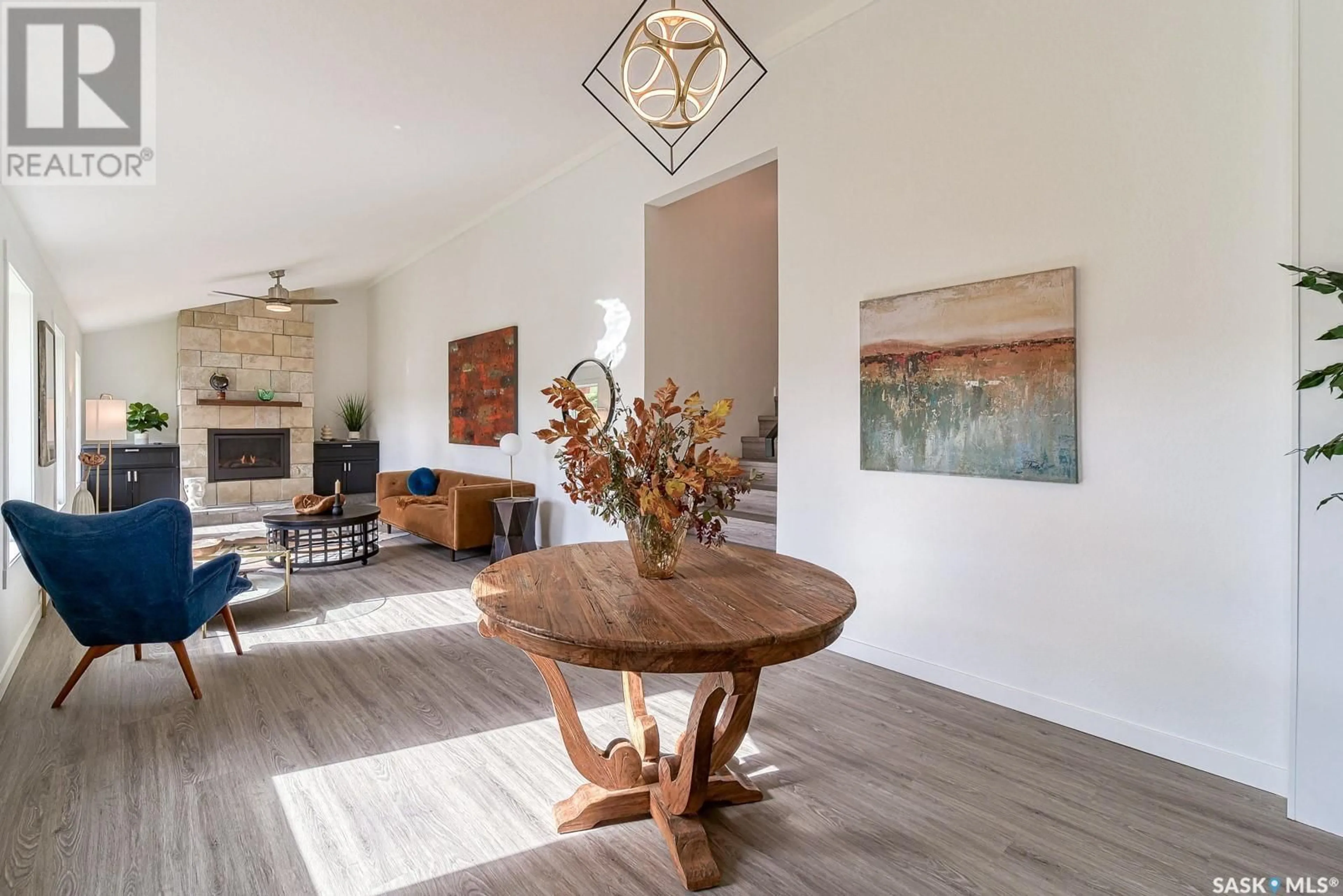 Living room with furniture, wood/laminate floor for RIVER'S EDGE ACREAGE, Moose Jaw Rm No. 161 Saskatchewan S0H0N0