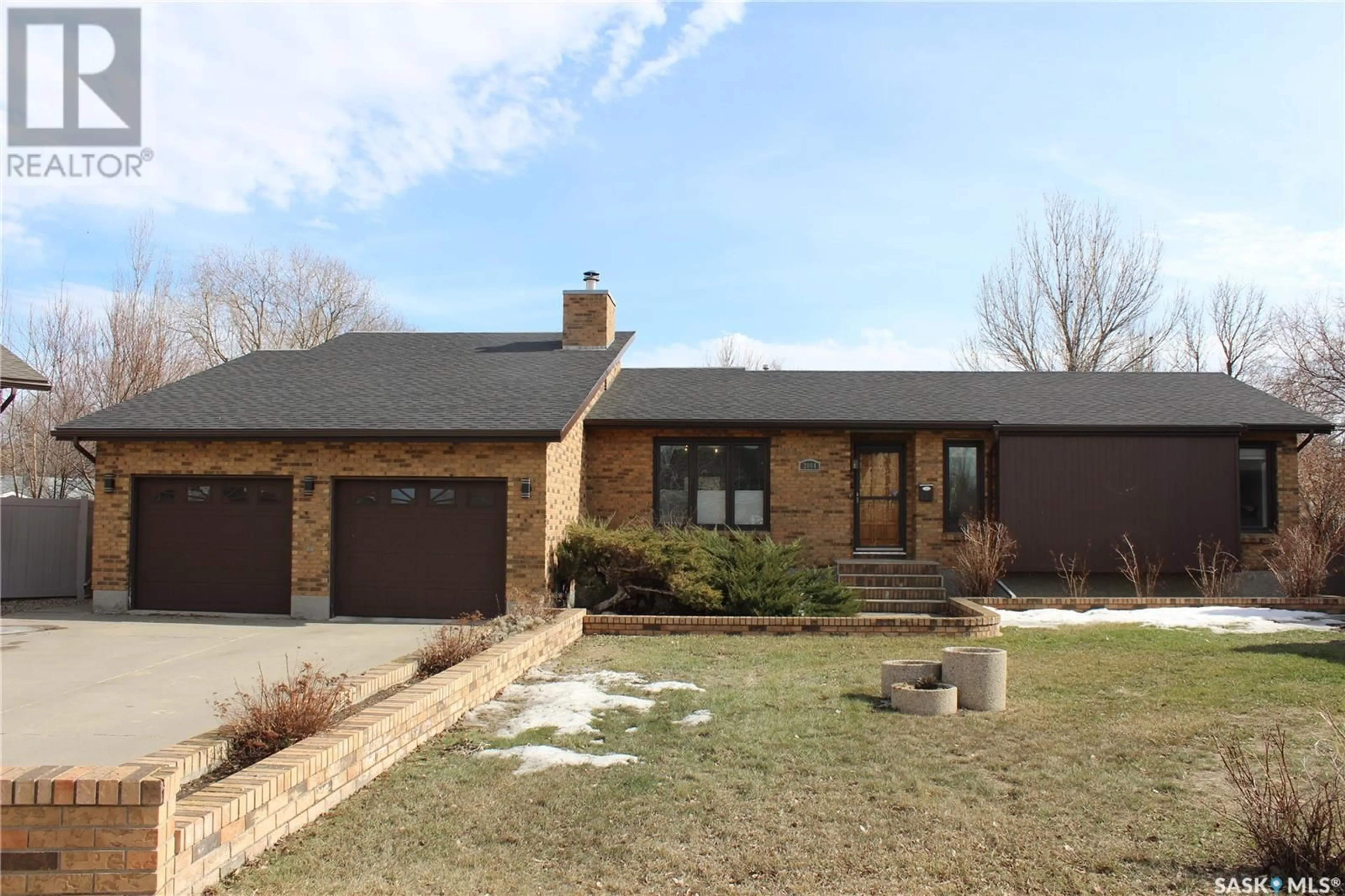 Home with brick exterior material, street for 2004 MACK PLACE, Estevan Saskatchewan S4A2L4
