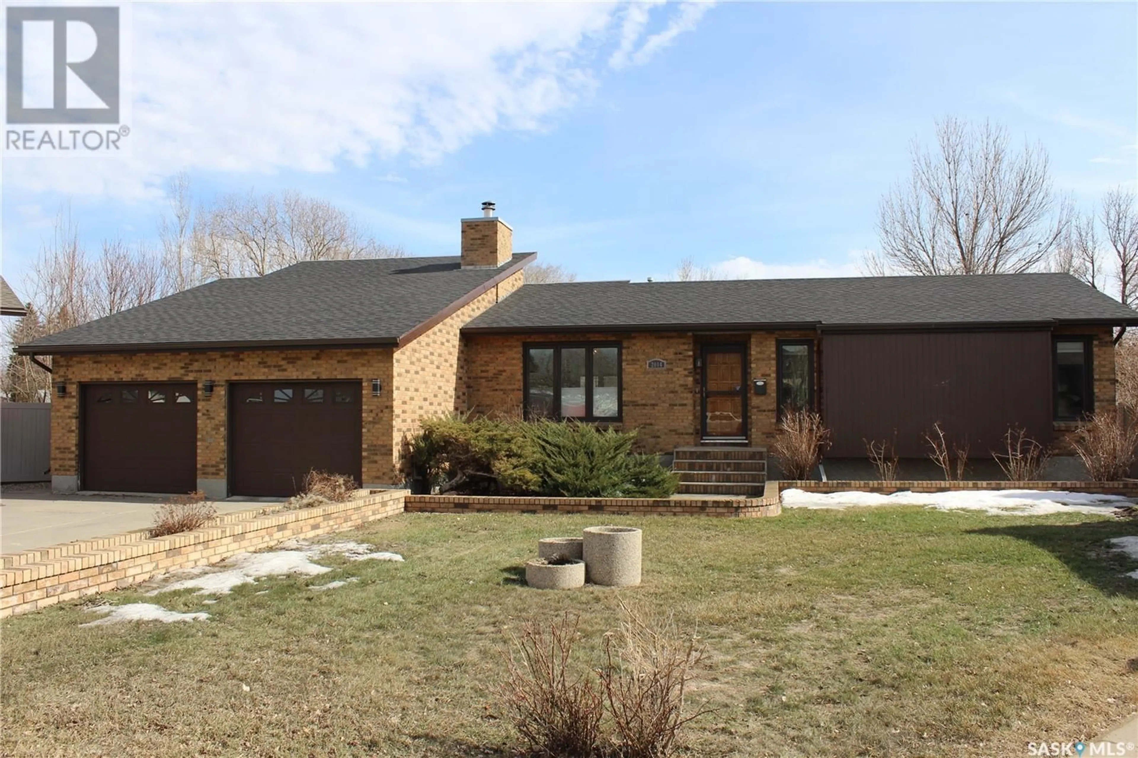 Home with brick exterior material, street for 2004 MACK PLACE, Estevan Saskatchewan S4A2L4