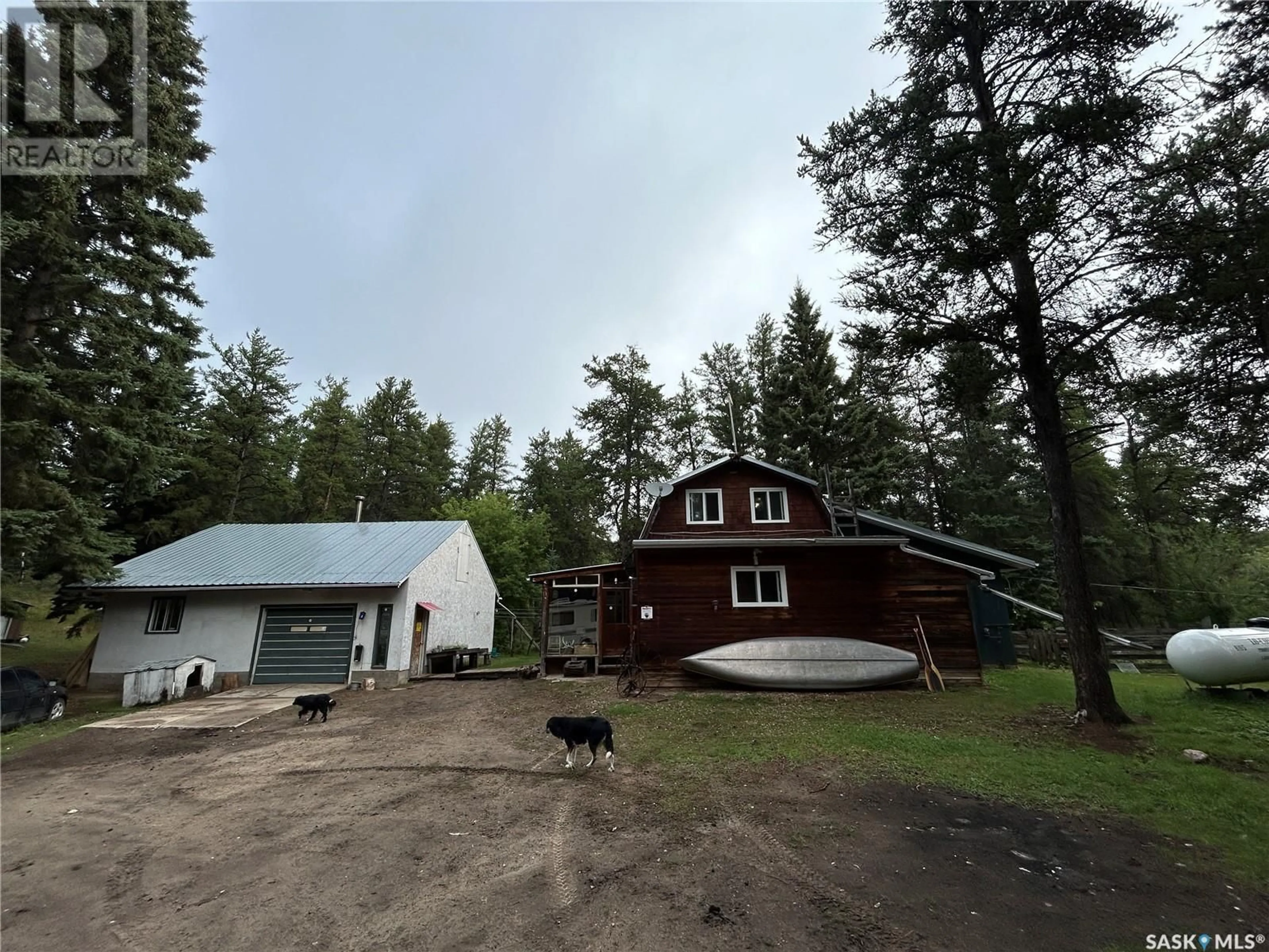 A pic from outside/outdoor area/front of a property/back of a property/a pic from drone, forest/trees view for HORSE LAKE ACREAGE, Duck Lake Rm No. 463 Saskatchewan S0K1J0