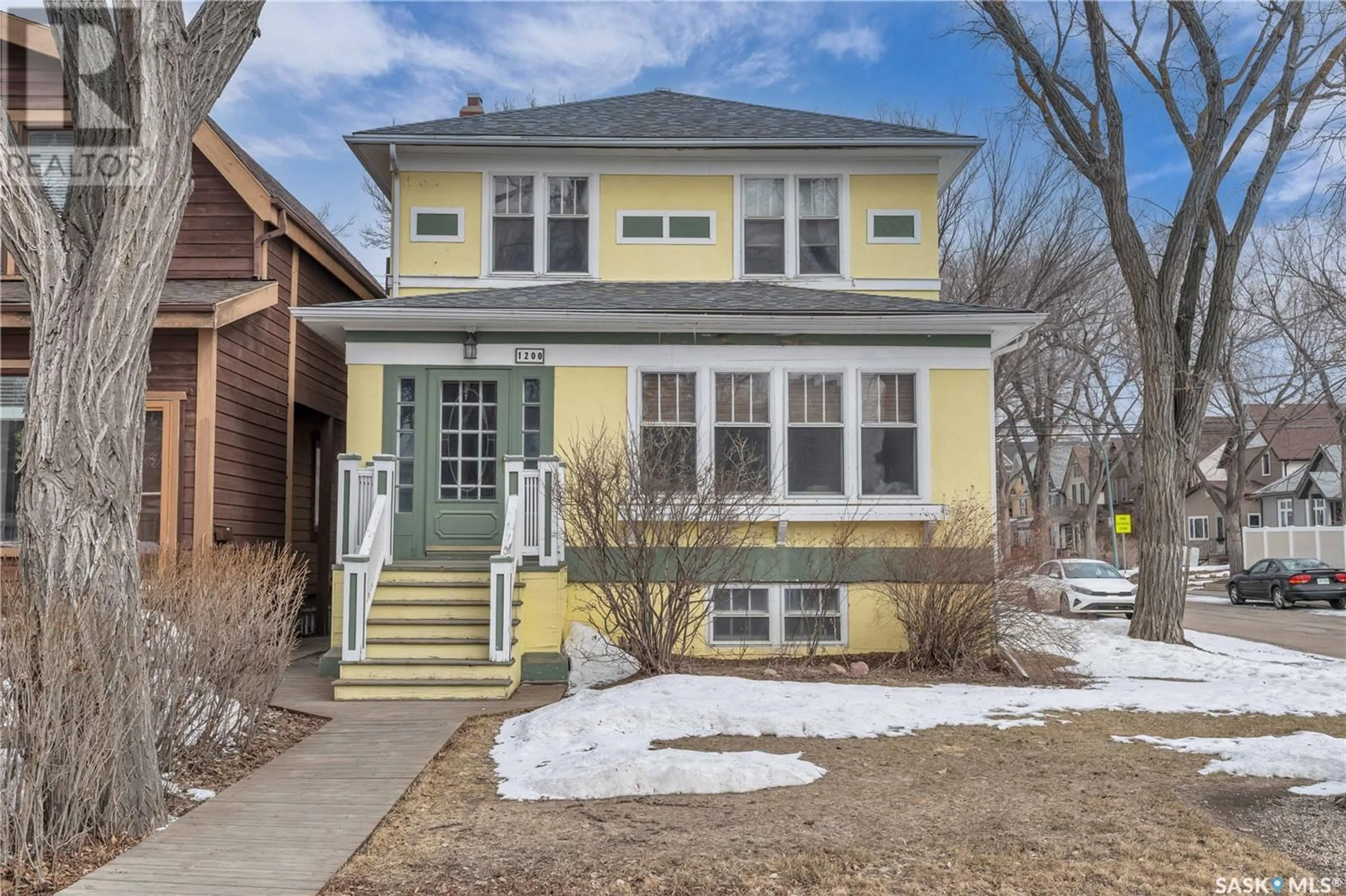 Home with brick exterior material, street for 1200 COLLEGE AVENUE, Regina Saskatchewan S4P1A9