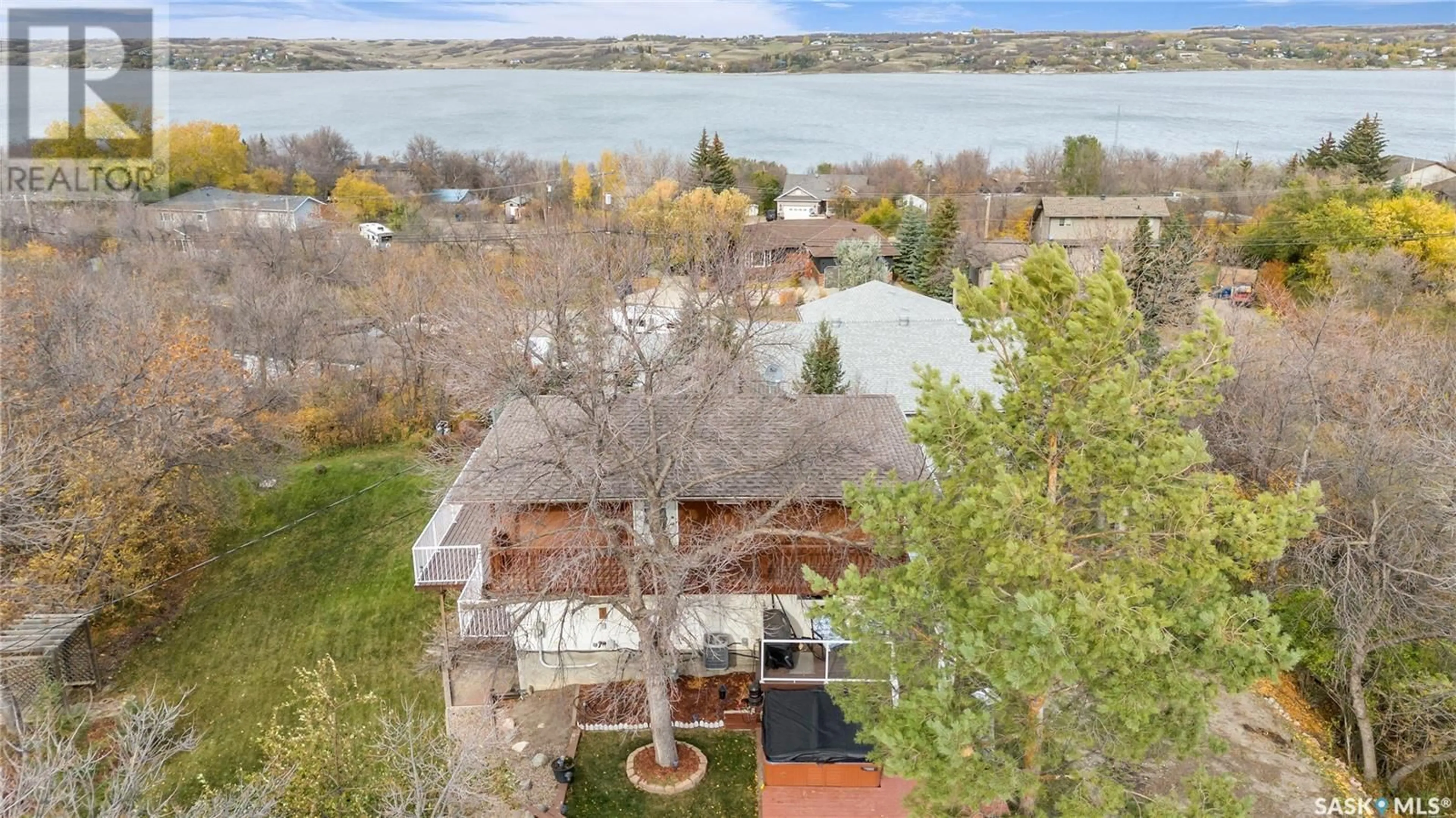 A pic from outside/outdoor area/front of a property/back of a property/a pic from drone, water/lake/river/ocean view for 256 WOODLAND AVENUE, Buena Vista Saskatchewan S2V1B3