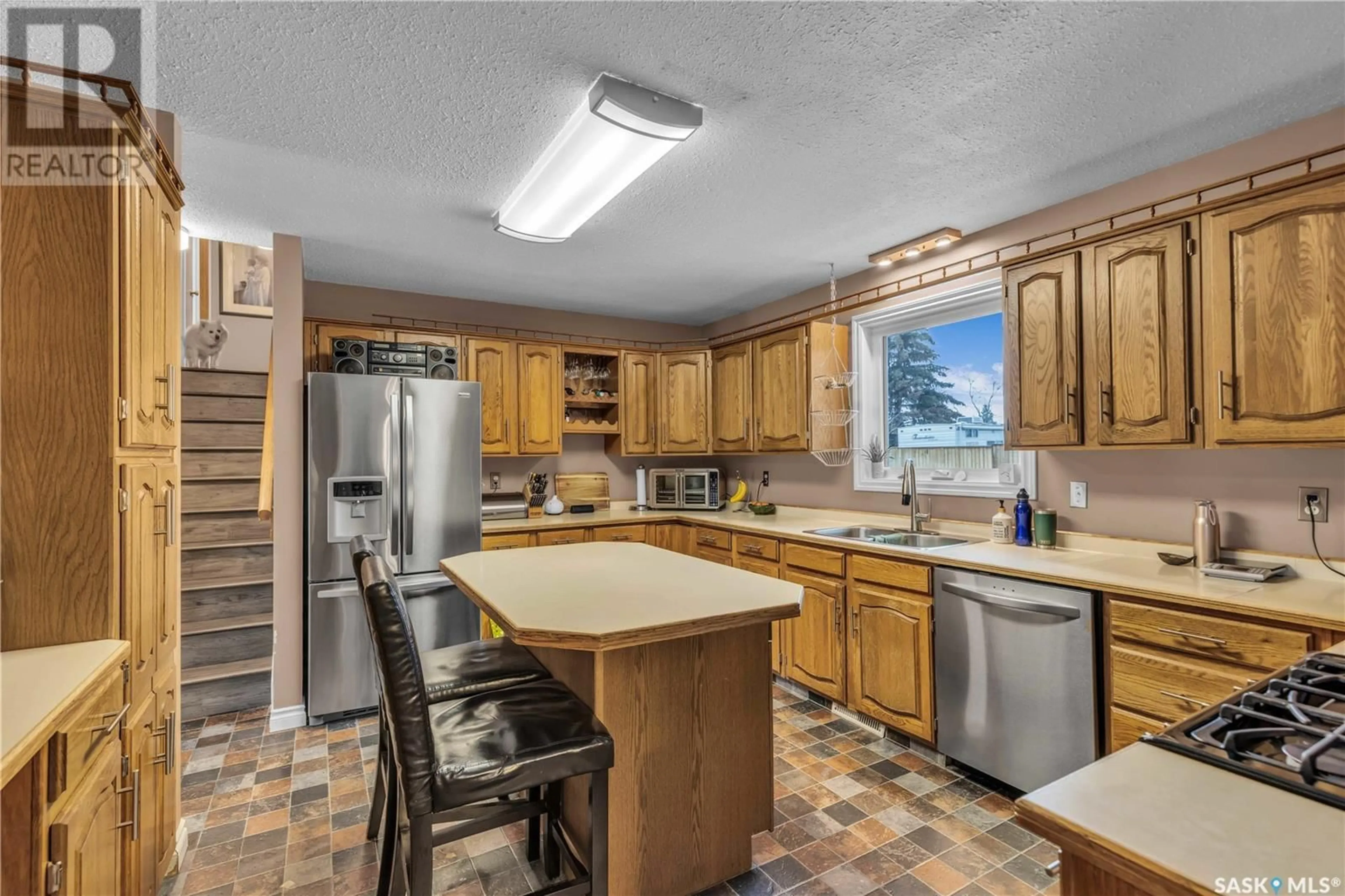 Standard kitchen, ceramic/tile floor for 10616 BENNETT CRESCENT, North Battleford Saskatchewan S9A3X3