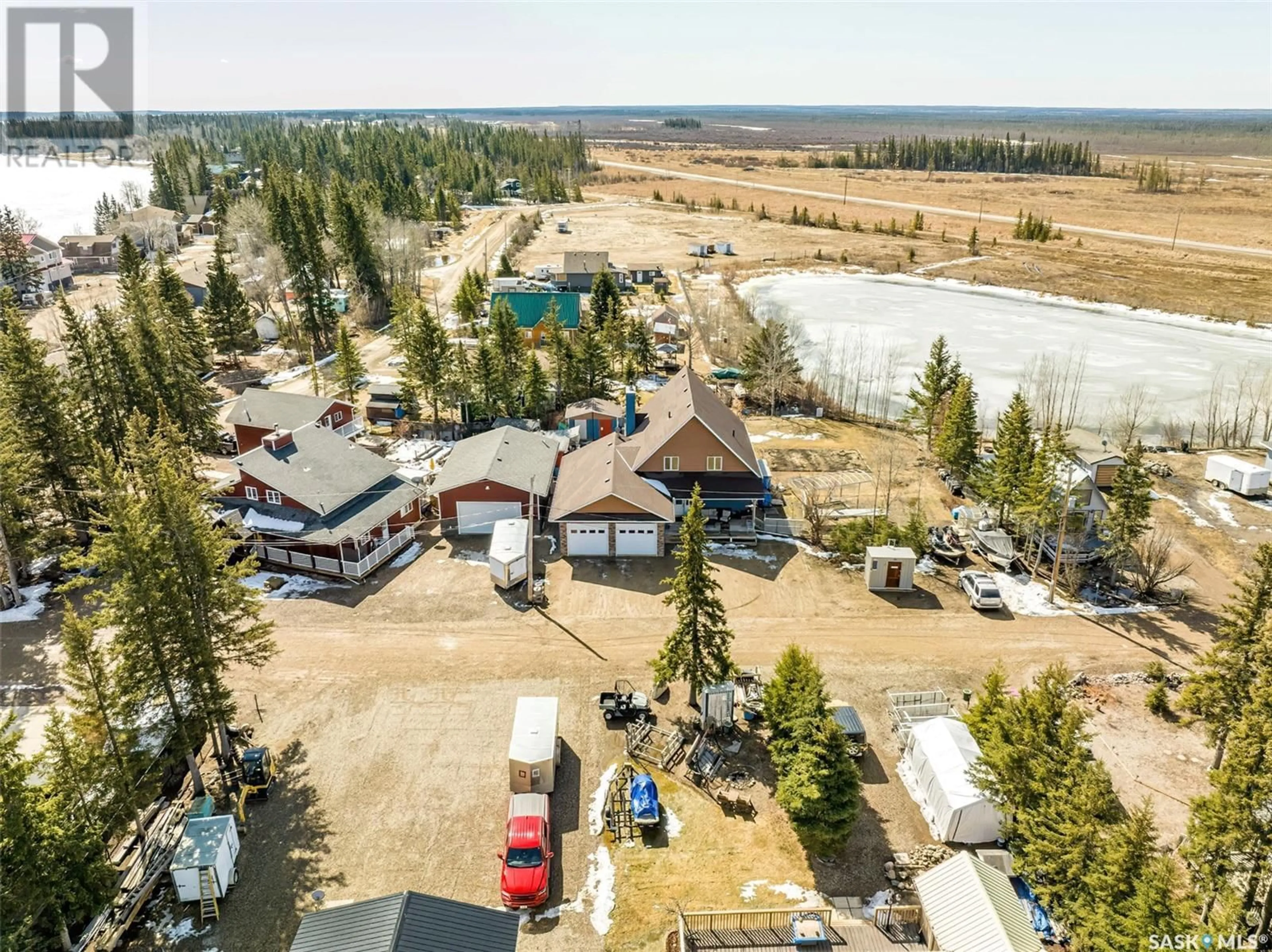 A pic from outside/outdoor area/front of a property/back of a property/a pic from drone, water/lake/river/ocean view for 3 WAYNE PLACE, Candle Lake Saskatchewan S0J3E0