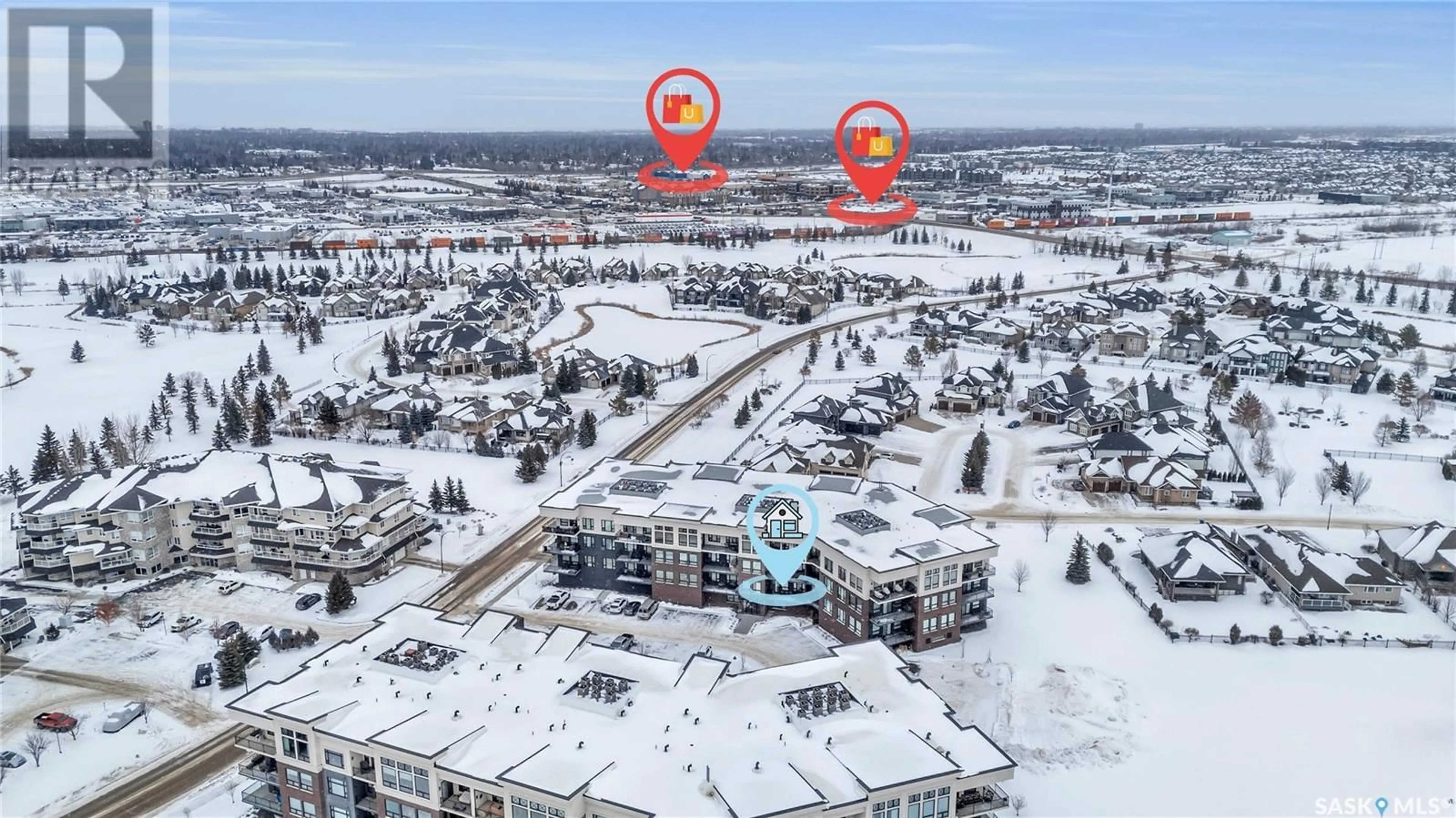 A pic from outside/outdoor area/front of a property/back of a property/a pic from drone, unknown for 210 - 408 CARTWRIGHT STREET, Saskatoon Saskatchewan S7T0X1