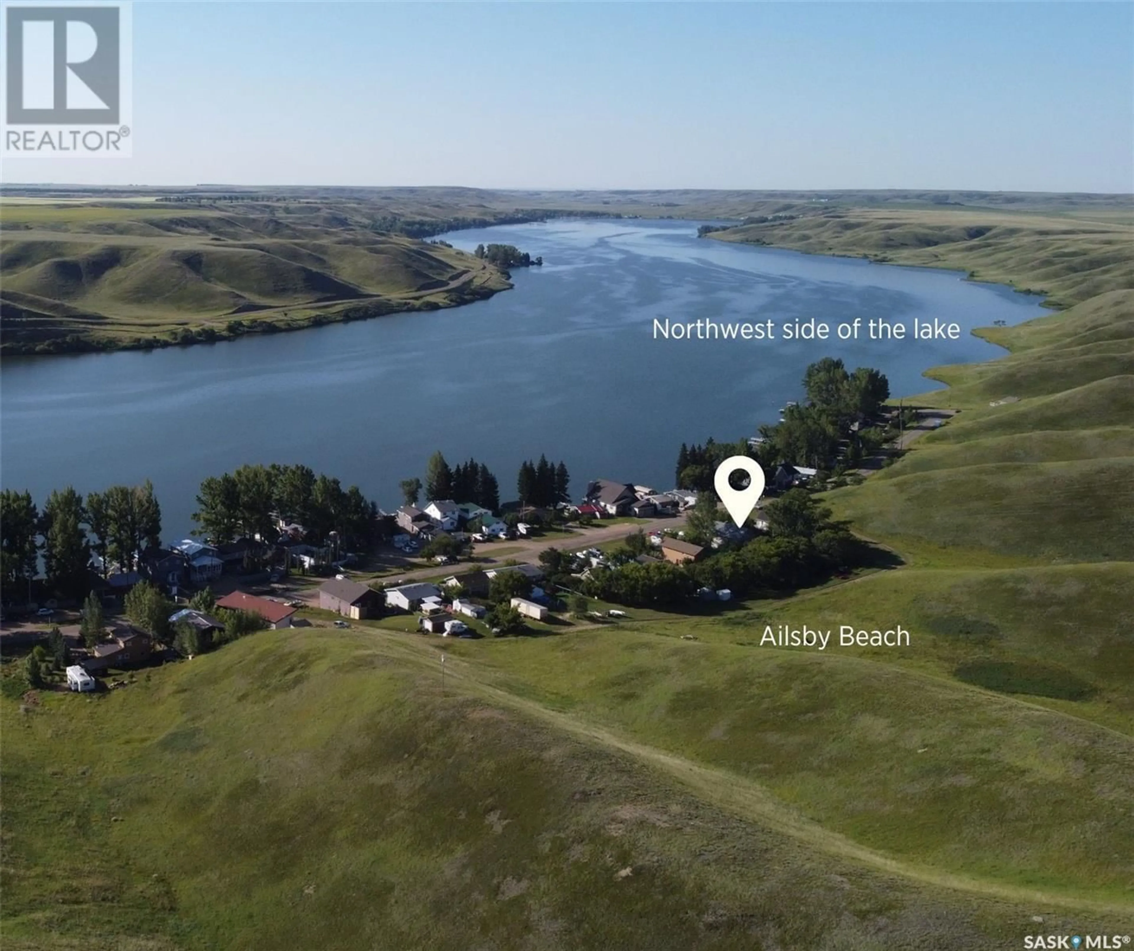 A pic from outside/outdoor area/front of a property/back of a property/a pic from drone, water/lake/river/ocean view for 202 WALL RIDGE TRAIL, Lac Pelletier Rm No. 107 Saskatchewan S0N2N0