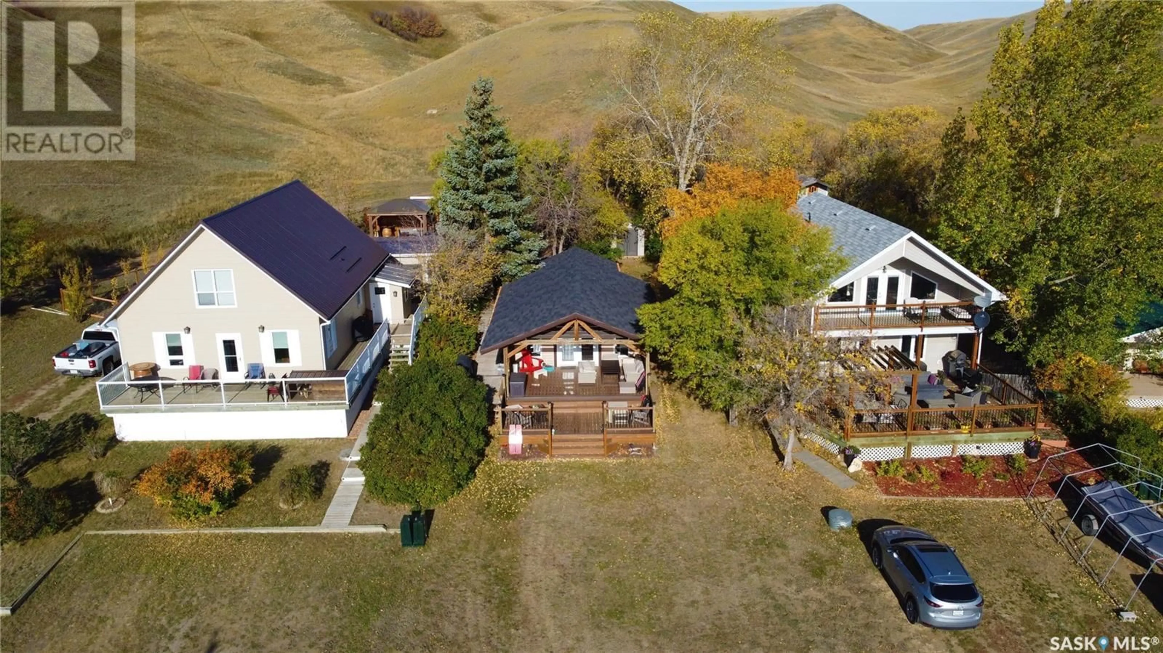 A pic from outside/outdoor area/front of a property/back of a property/a pic from drone, mountain view for 202 WALL RIDGE TRAIL, Lac Pelletier Rm No. 107 Saskatchewan S0N2N0