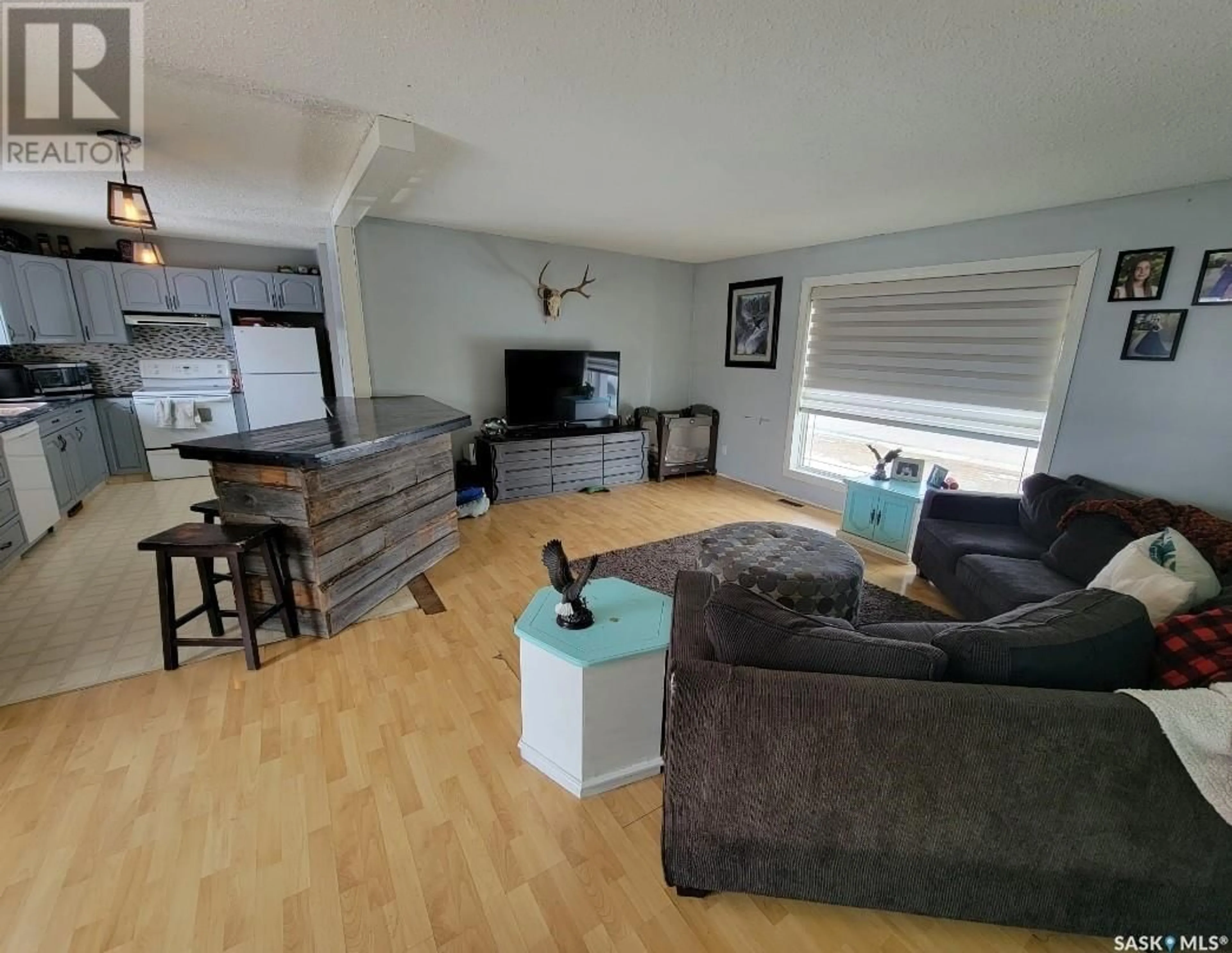 A pic from outside/outdoor area/front of a property/back of a property/a pic from drone, street for 5034 MIRROR DRIVE, Macklin Saskatchewan S0L2S0