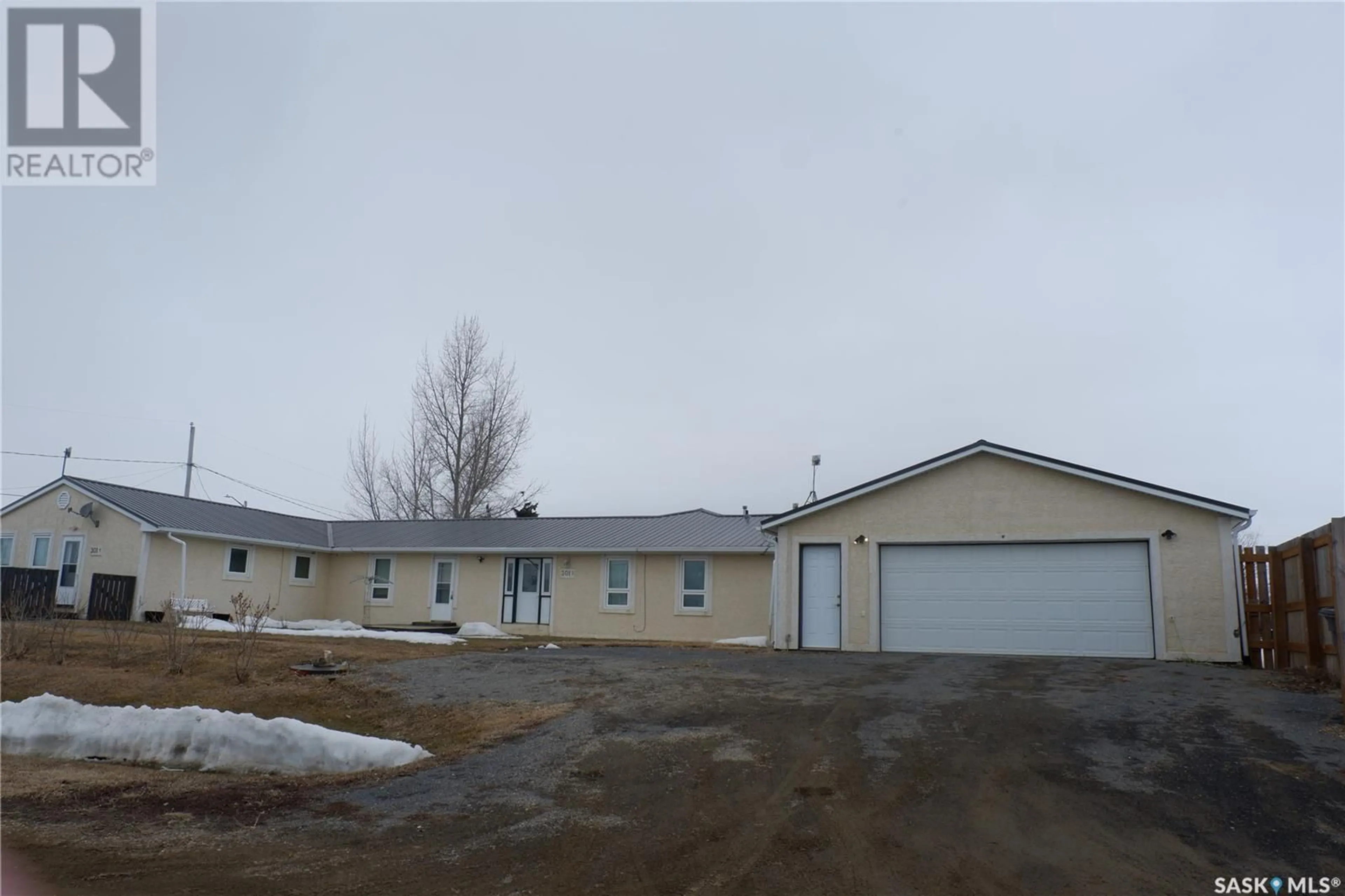A pic from outside/outdoor area/front of a property/back of a property/a pic from drone, building for 301 ASSINIBOIA AVENUE, Belle Plaine Saskatchewan S0G0W0