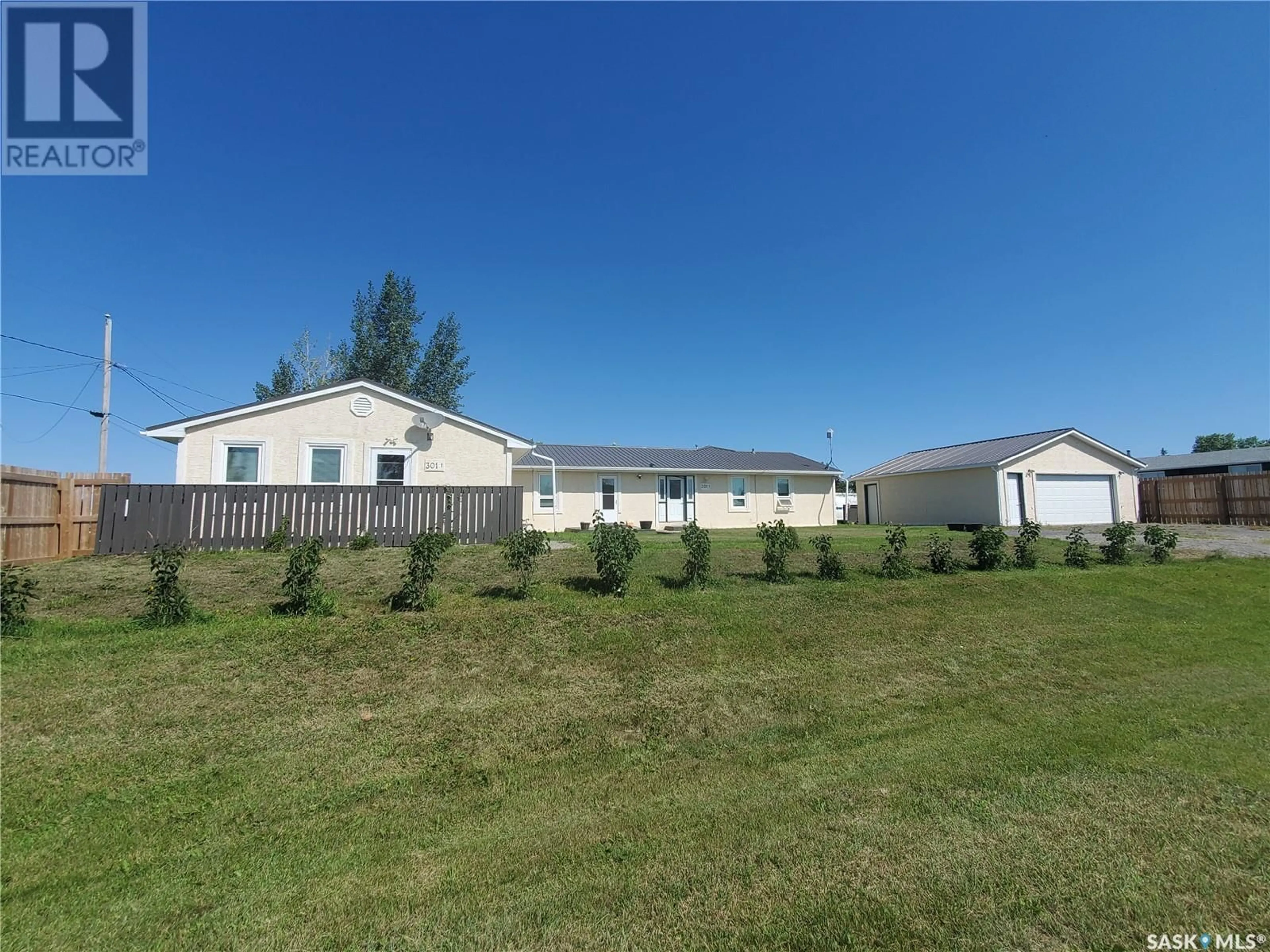 A pic from outside/outdoor area/front of a property/back of a property/a pic from drone, building for 301 ASSINIBOIA AVENUE, Belle Plaine Saskatchewan S0G0W0