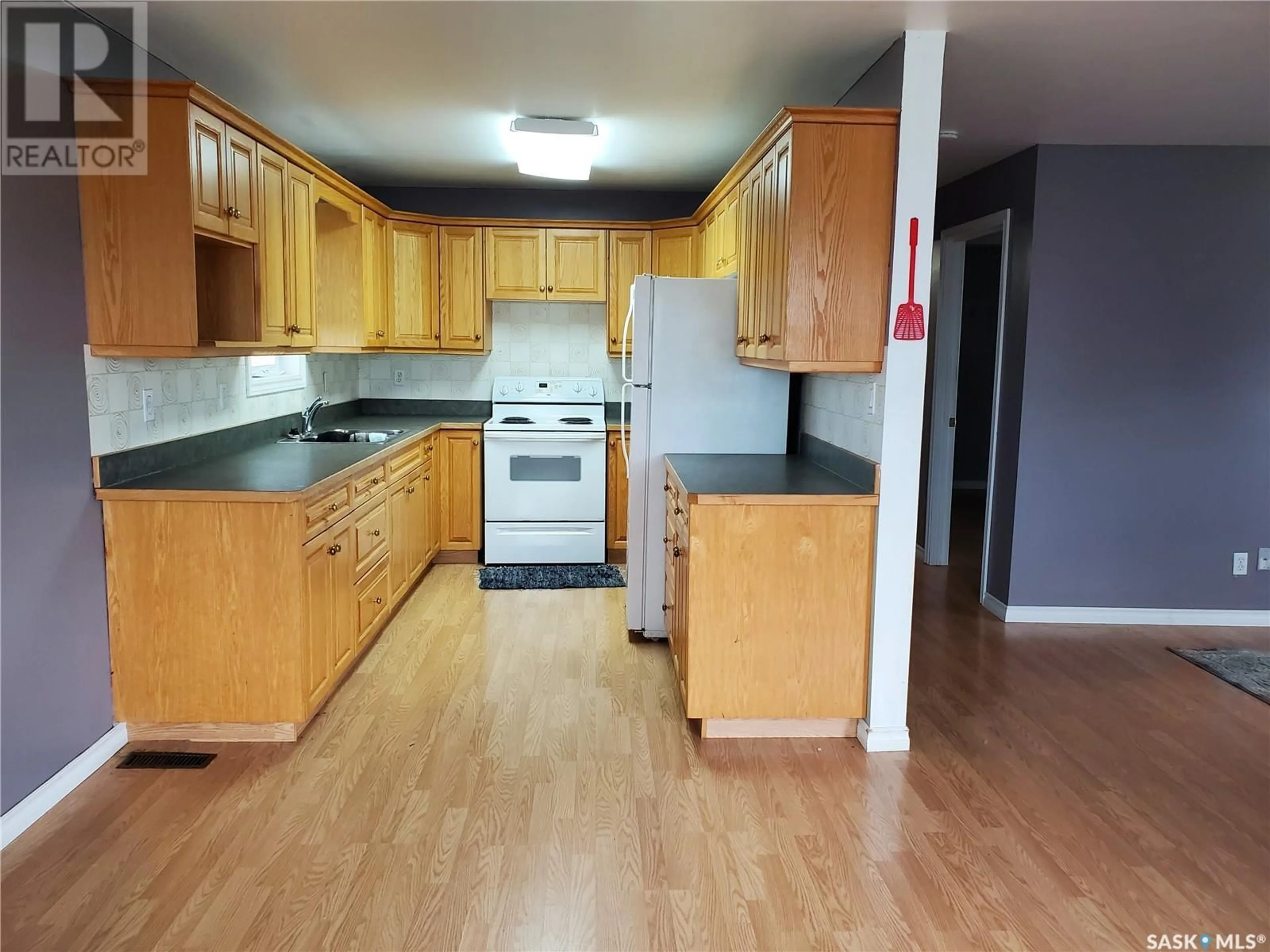 Standard kitchen, wood/laminate floor for 301 ASSINIBOIA AVENUE, Belle Plaine Saskatchewan S0G0W0