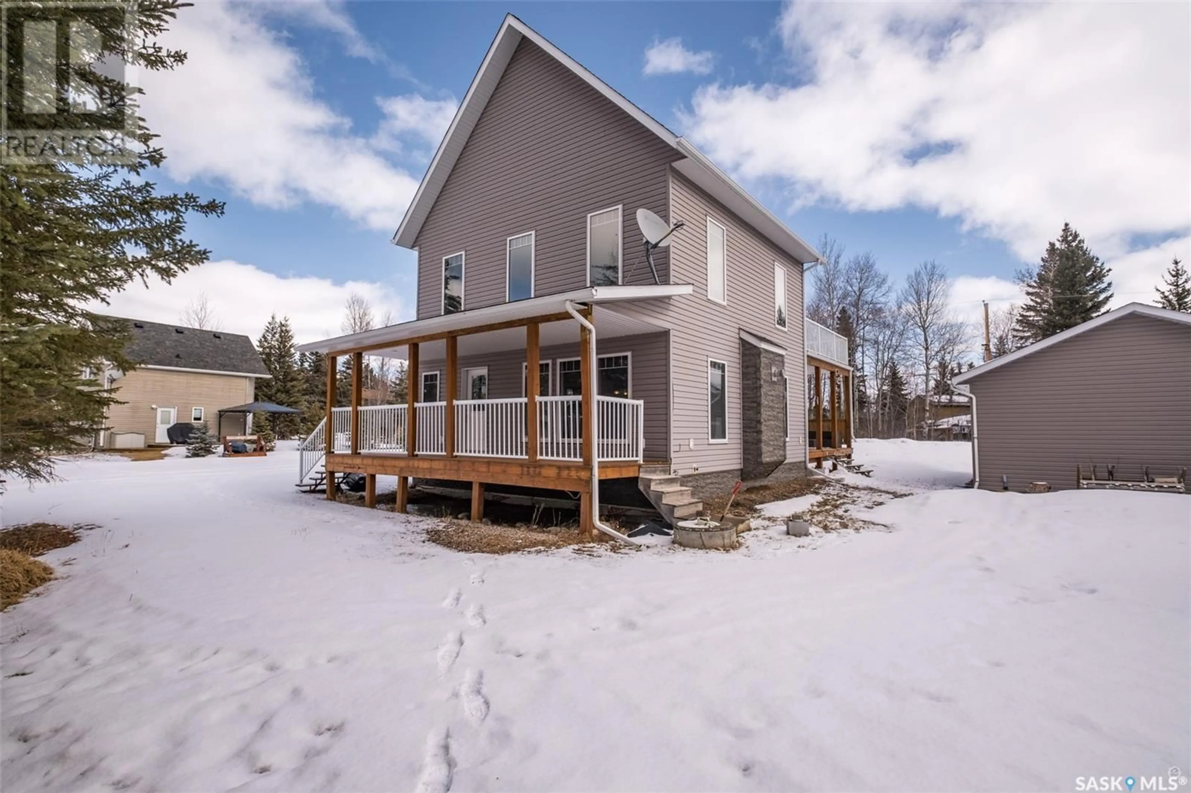 A pic from outside/outdoor area/front of a property/back of a property/a pic from drone, unknown for 8 BOOTS BAY, Candle Lake Saskatchewan S0J3E0