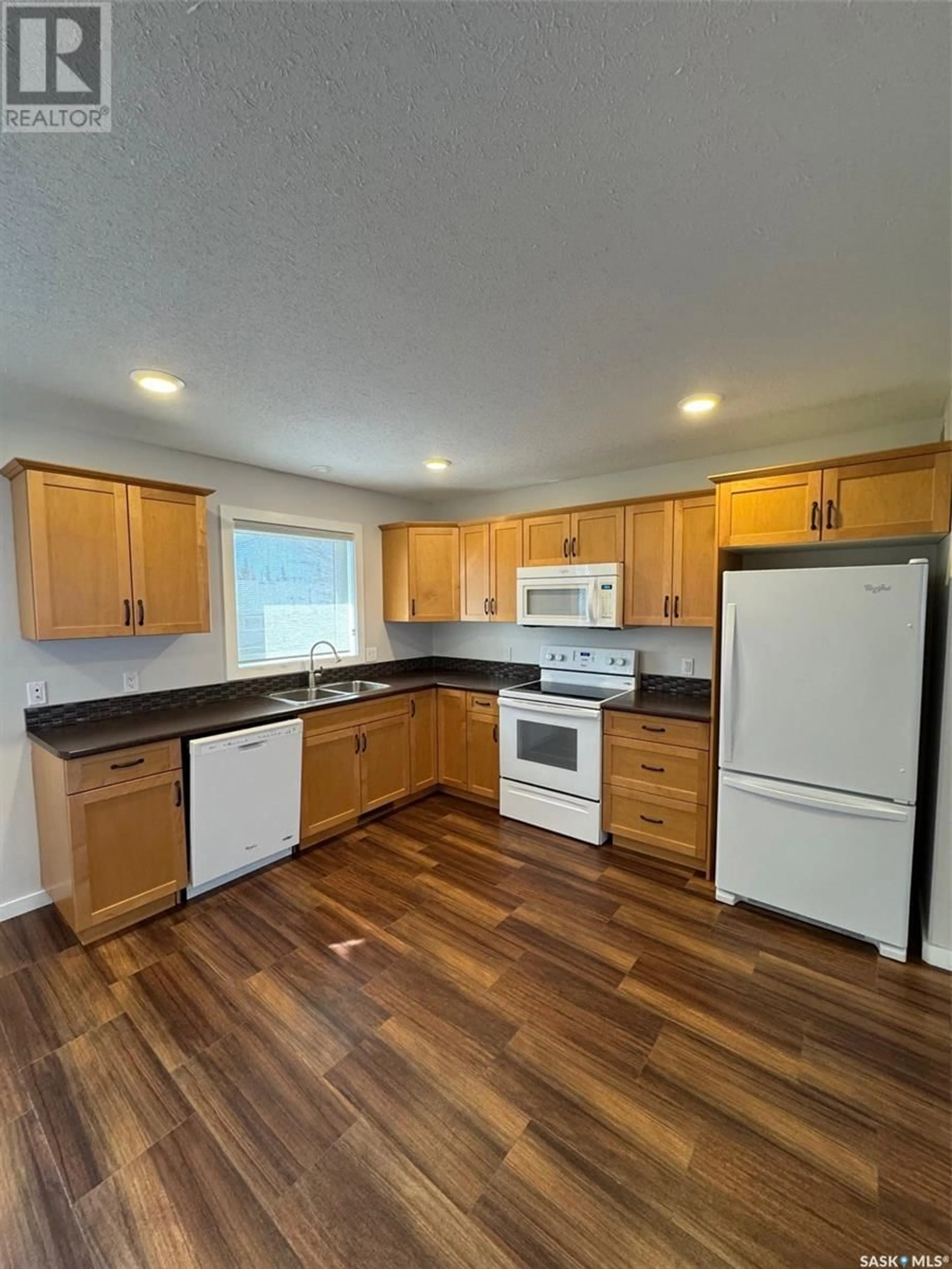 Standard kitchen, wood/laminate floor for 173 26TH STREET, Battleford Saskatchewan S0M0E0