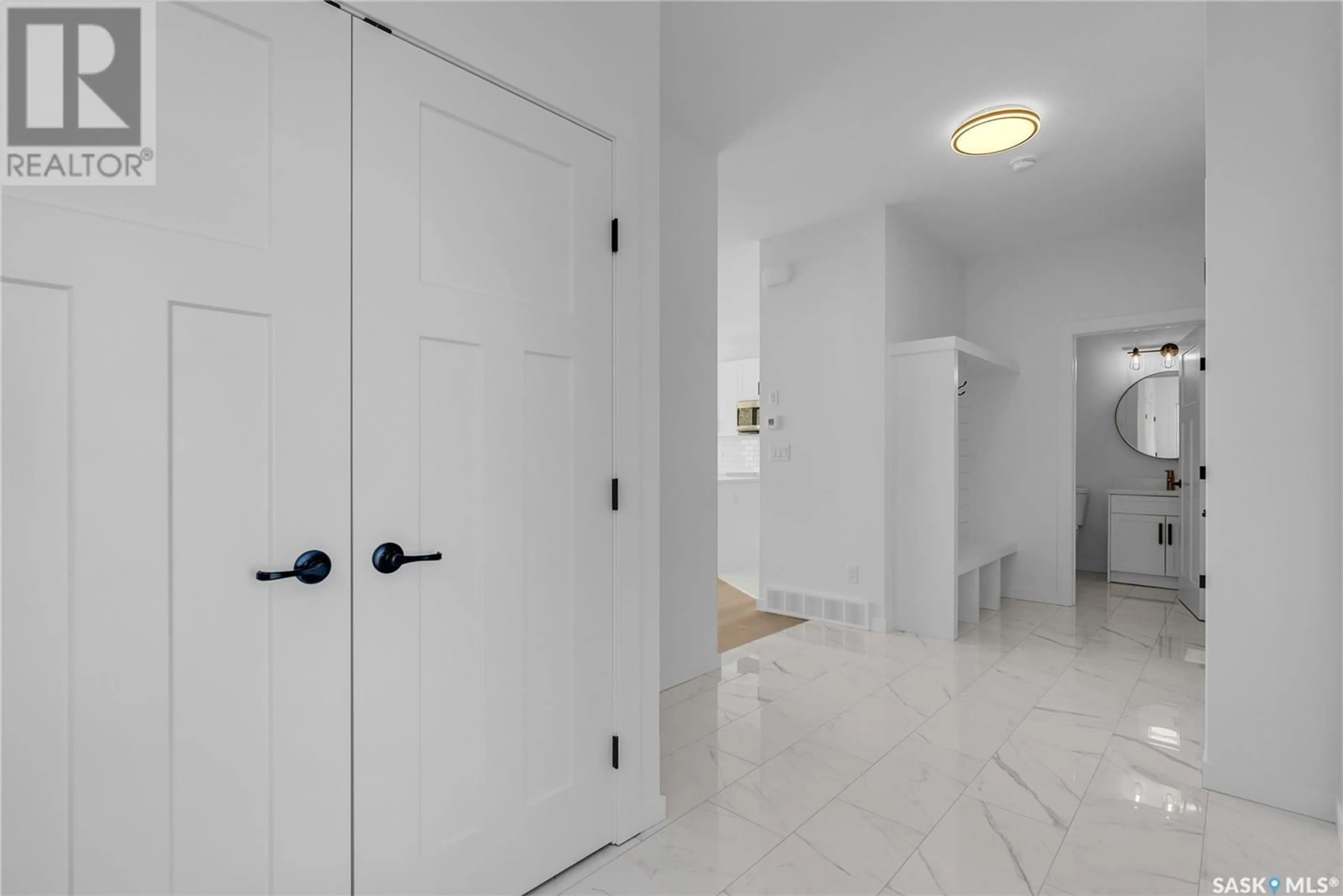 Indoor foyer for 347 SHARMA CRESCENT, Saskatoon Saskatchewan S7W1K9