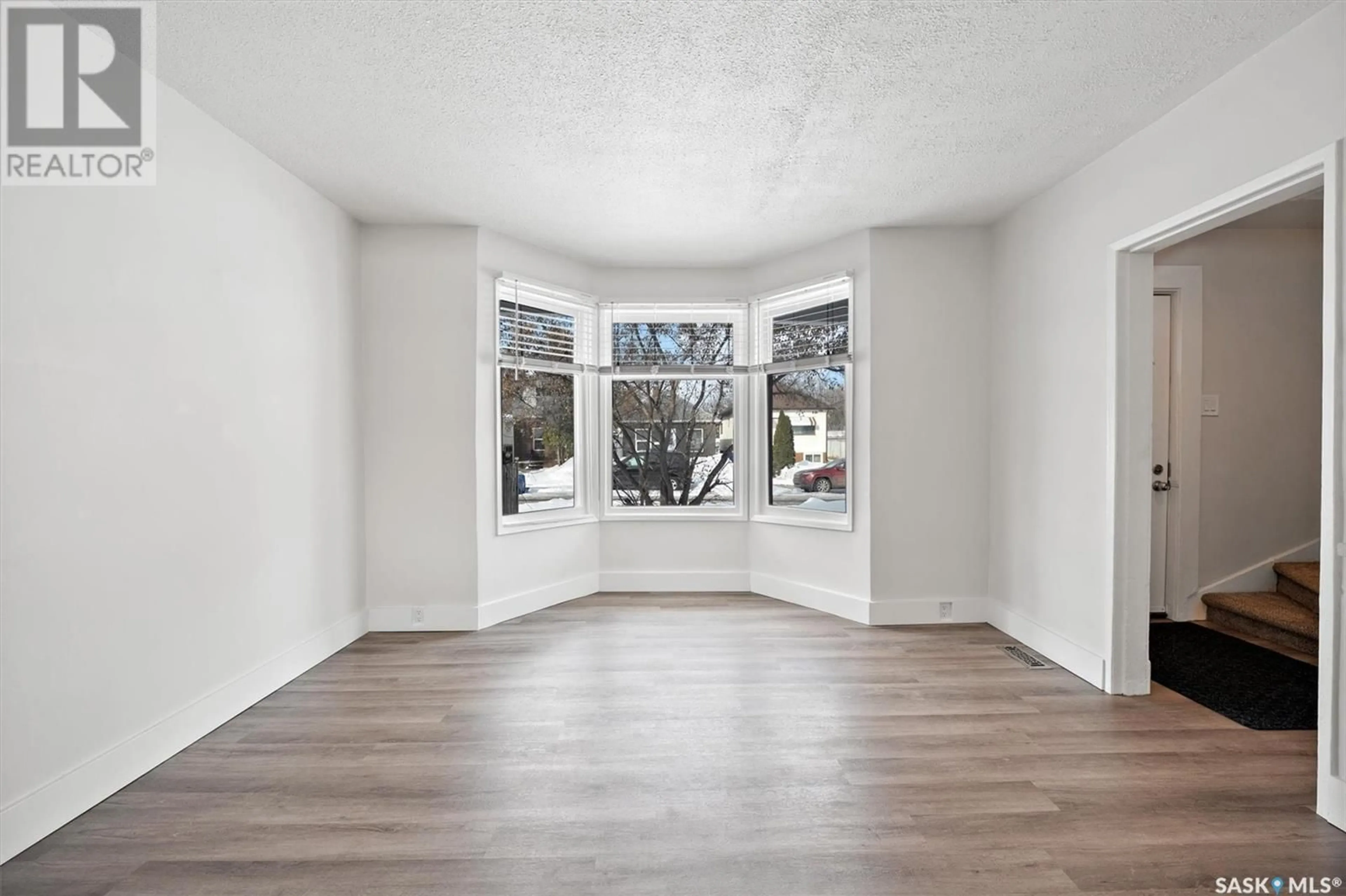 Home with vinyl exterior material, street for 314 U AVENUE, Saskatoon Saskatchewan S7M3C3